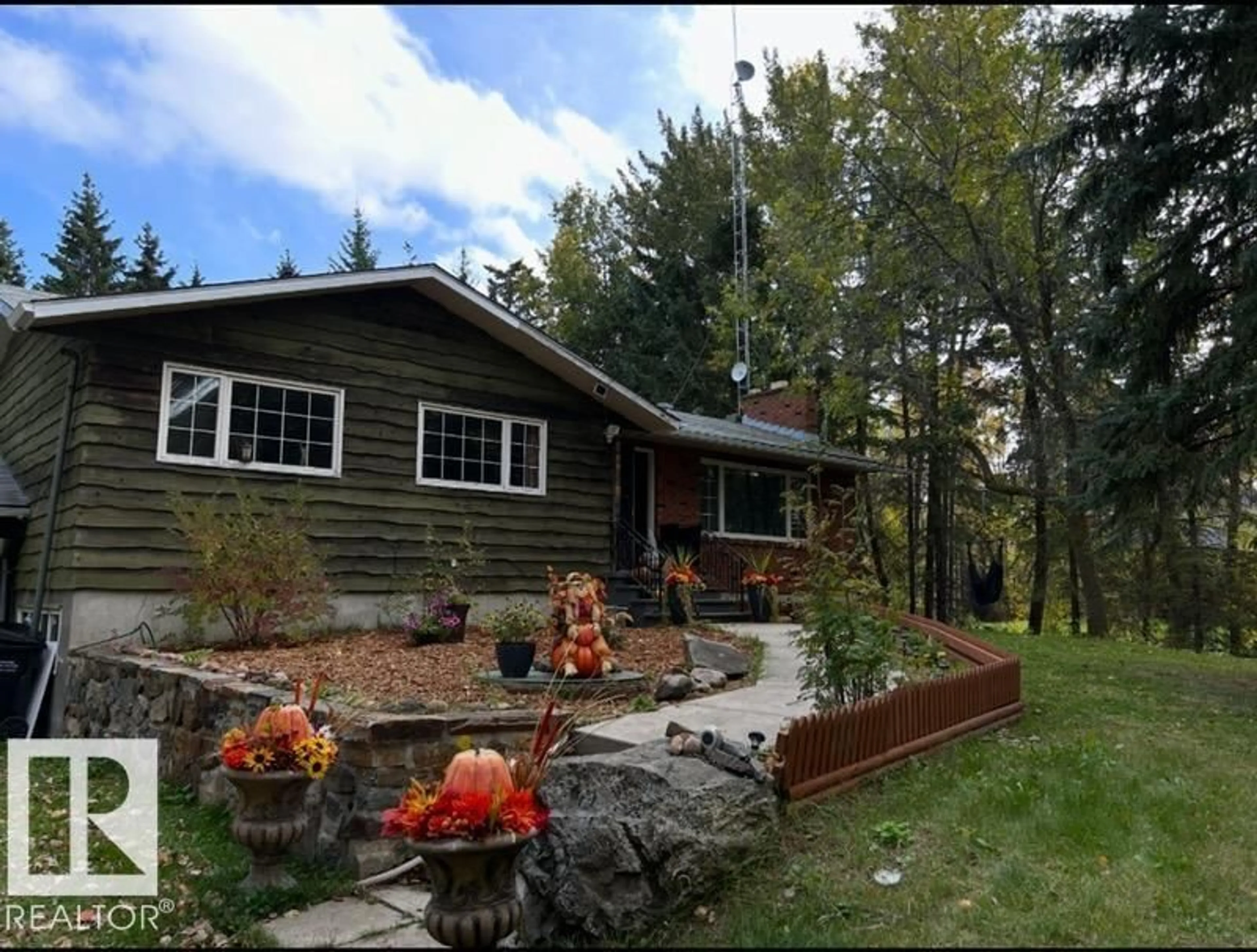 A pic from outside/outdoor area/front of a property/back of a property/a pic from drone, mountain view for 191 52343, Rural Strathcona County Alberta T8G1A6