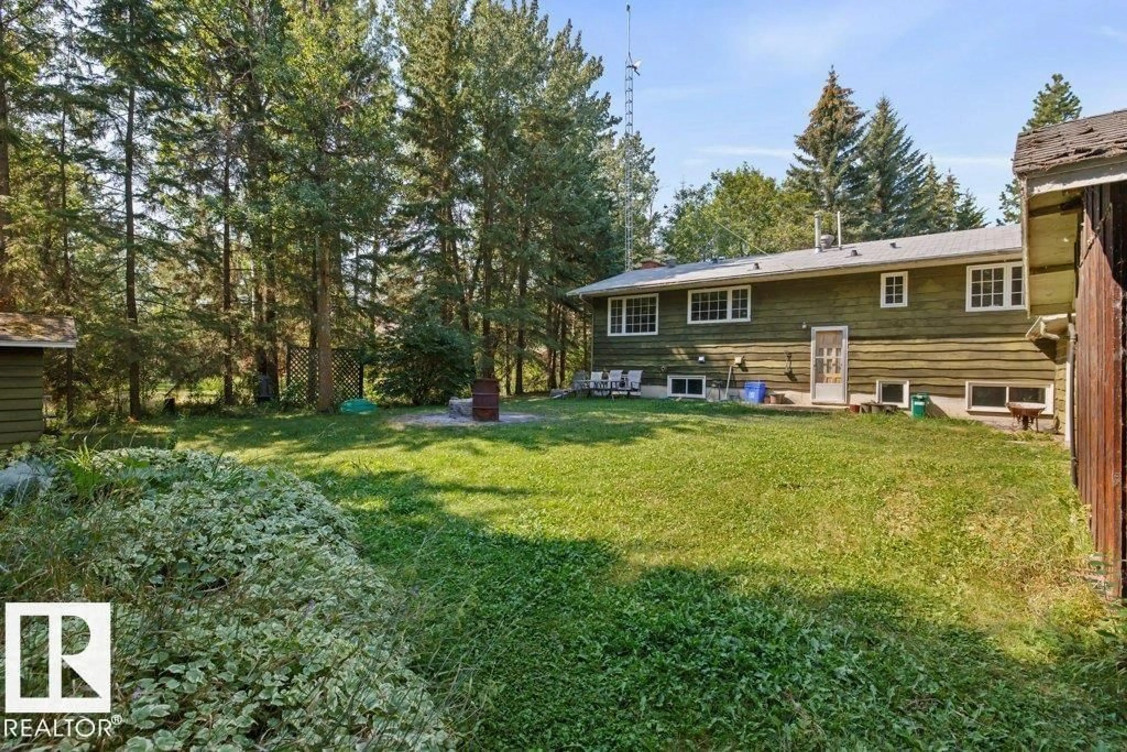 A pic from outside/outdoor area/front of a property/back of a property/a pic from drone, forest/trees view for 191 52343, Rural Strathcona County Alberta T8G1A6