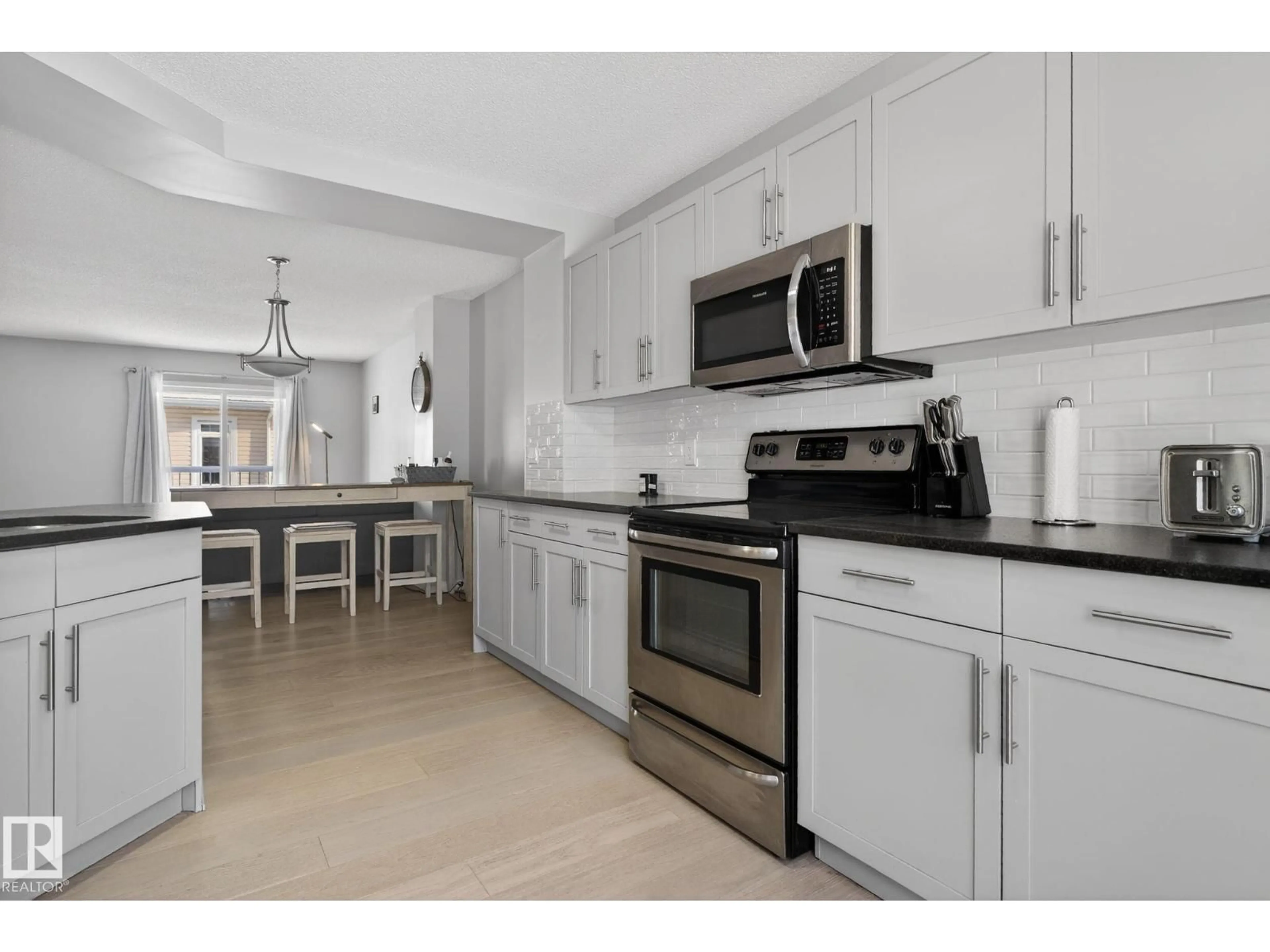 Open concept kitchen, ceramic/tile floor for 60 - 1804 70 ST, Edmonton Alberta T6X0H4