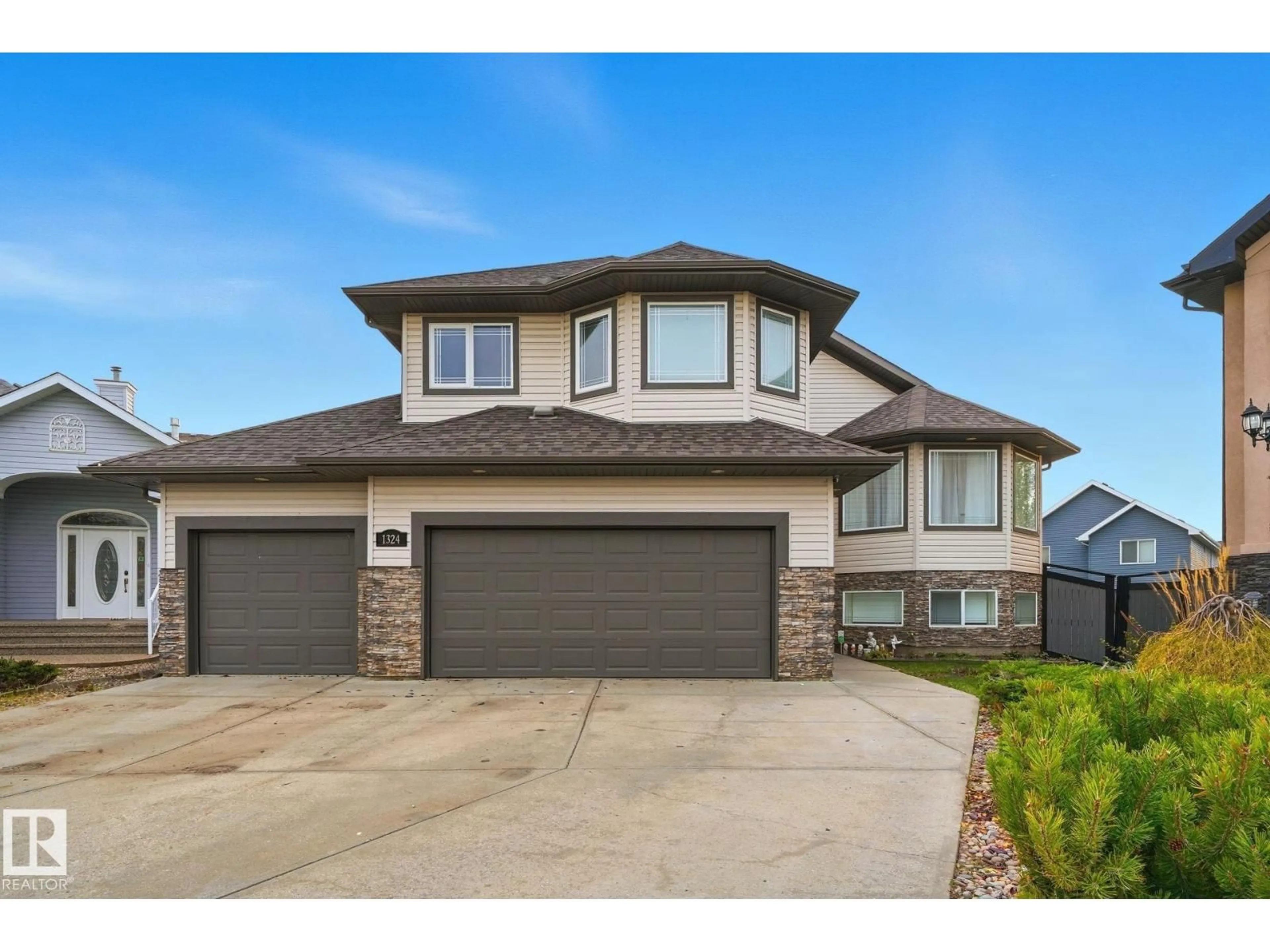 Home with brick exterior material, street for 1324 70 ST, Edmonton Alberta T6X1K9