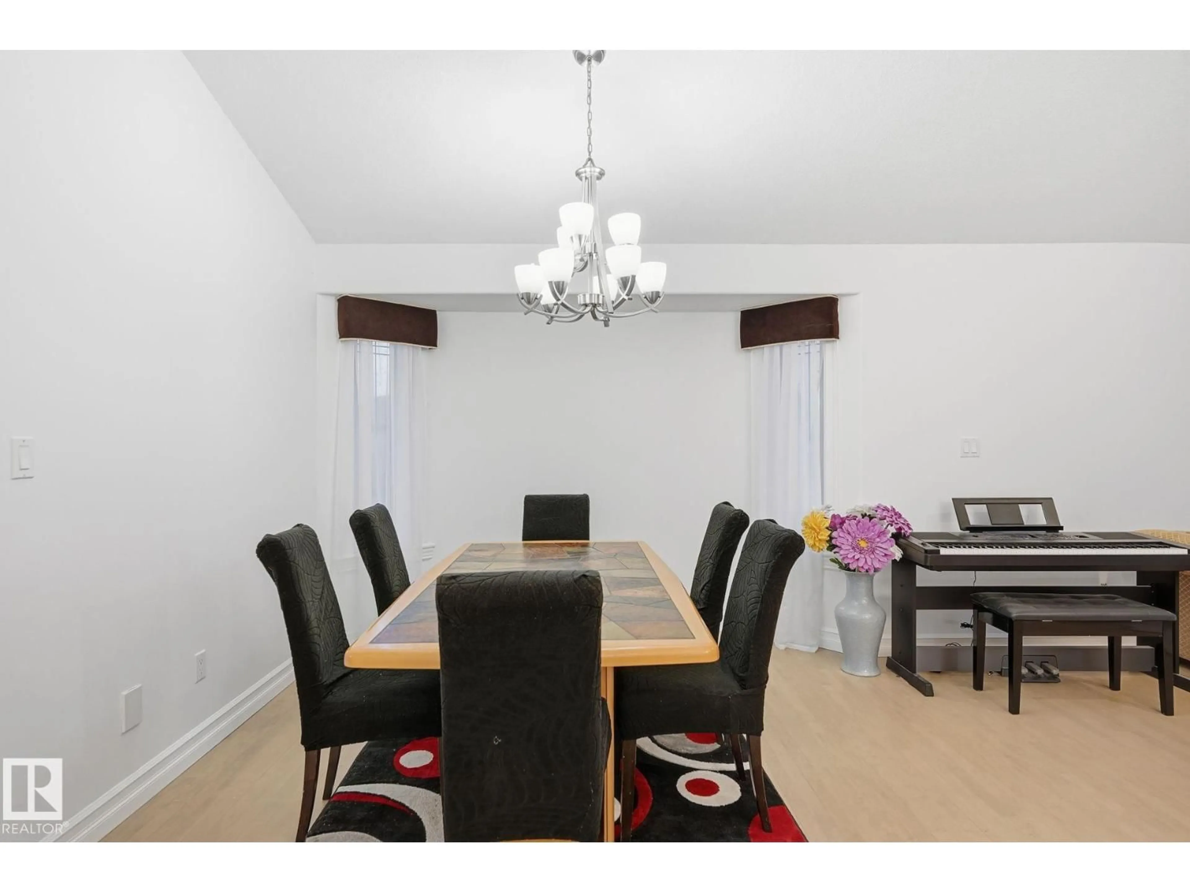 Dining room, wood/laminate floor for 1324 70 ST, Edmonton Alberta T6X1K9