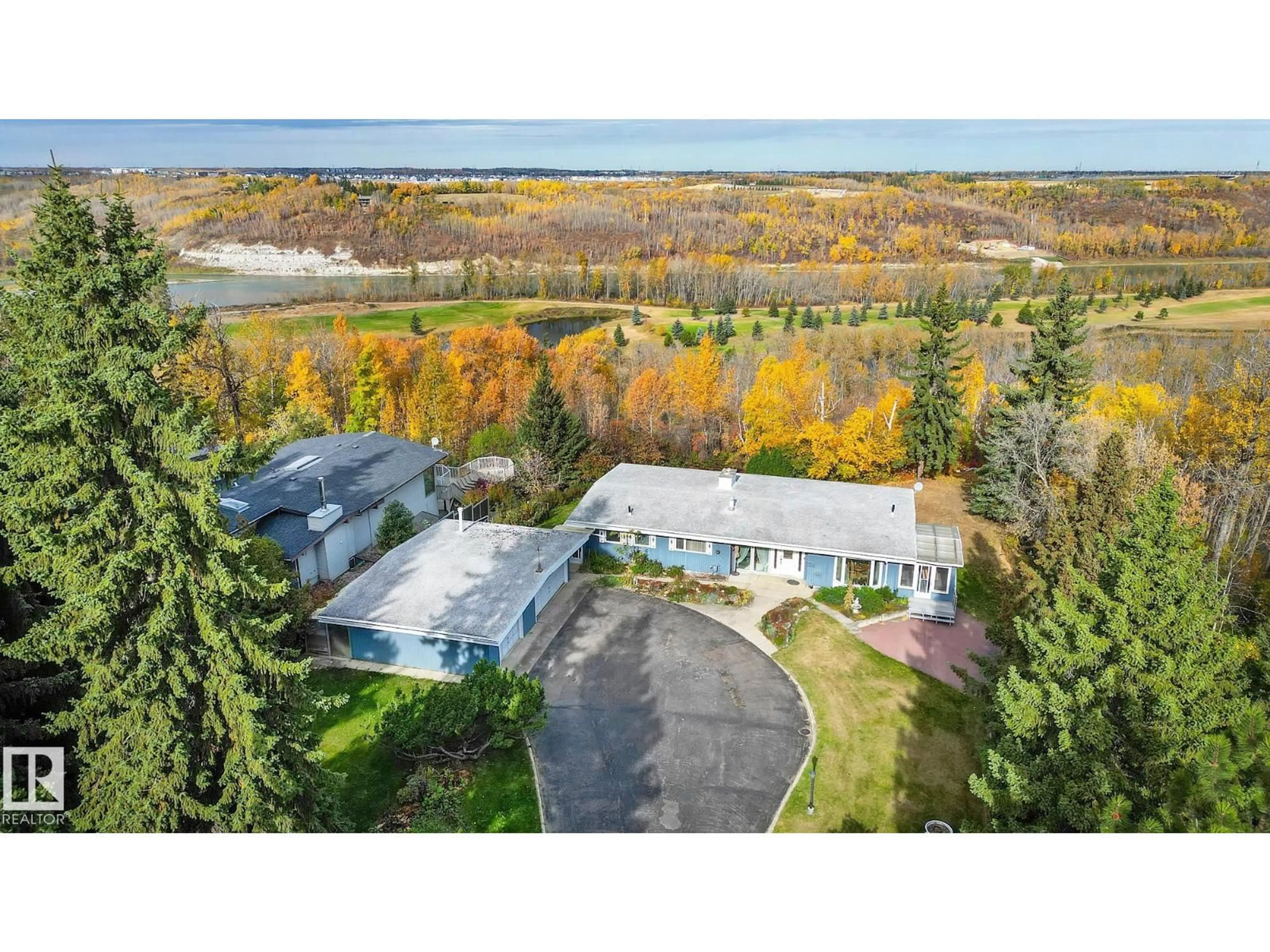 A pic from outside/outdoor area/front of a property/back of a property/a pic from drone, water/lake/river/ocean view for 140 WINDERMERE DR, Edmonton Alberta T6W0S4