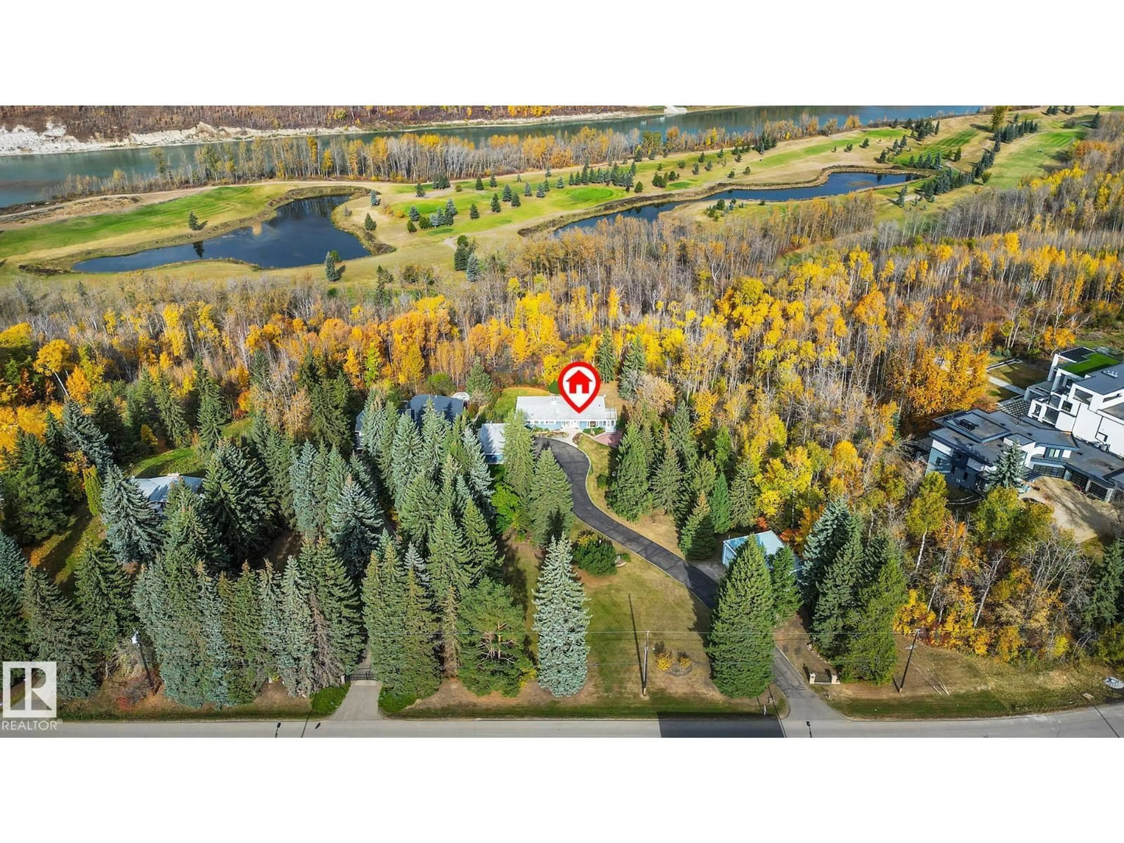 A pic from outside/outdoor area/front of a property/back of a property/a pic from drone, forest/trees view for 140 WINDERMERE DR, Edmonton Alberta T6W0S4