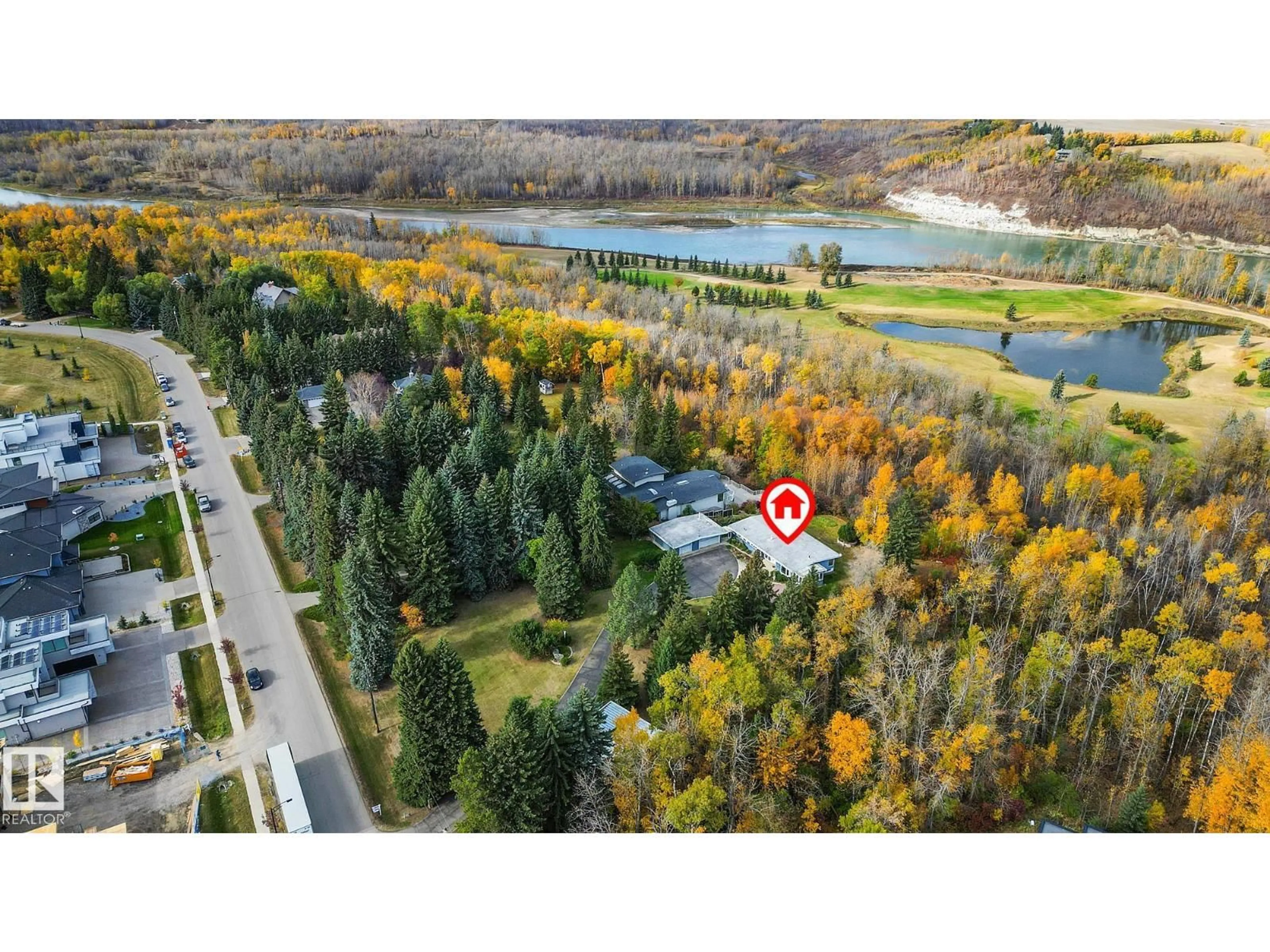 A pic from outside/outdoor area/front of a property/back of a property/a pic from drone, water/lake/river/ocean view for 140 WINDERMERE DR, Edmonton Alberta T6W0S4