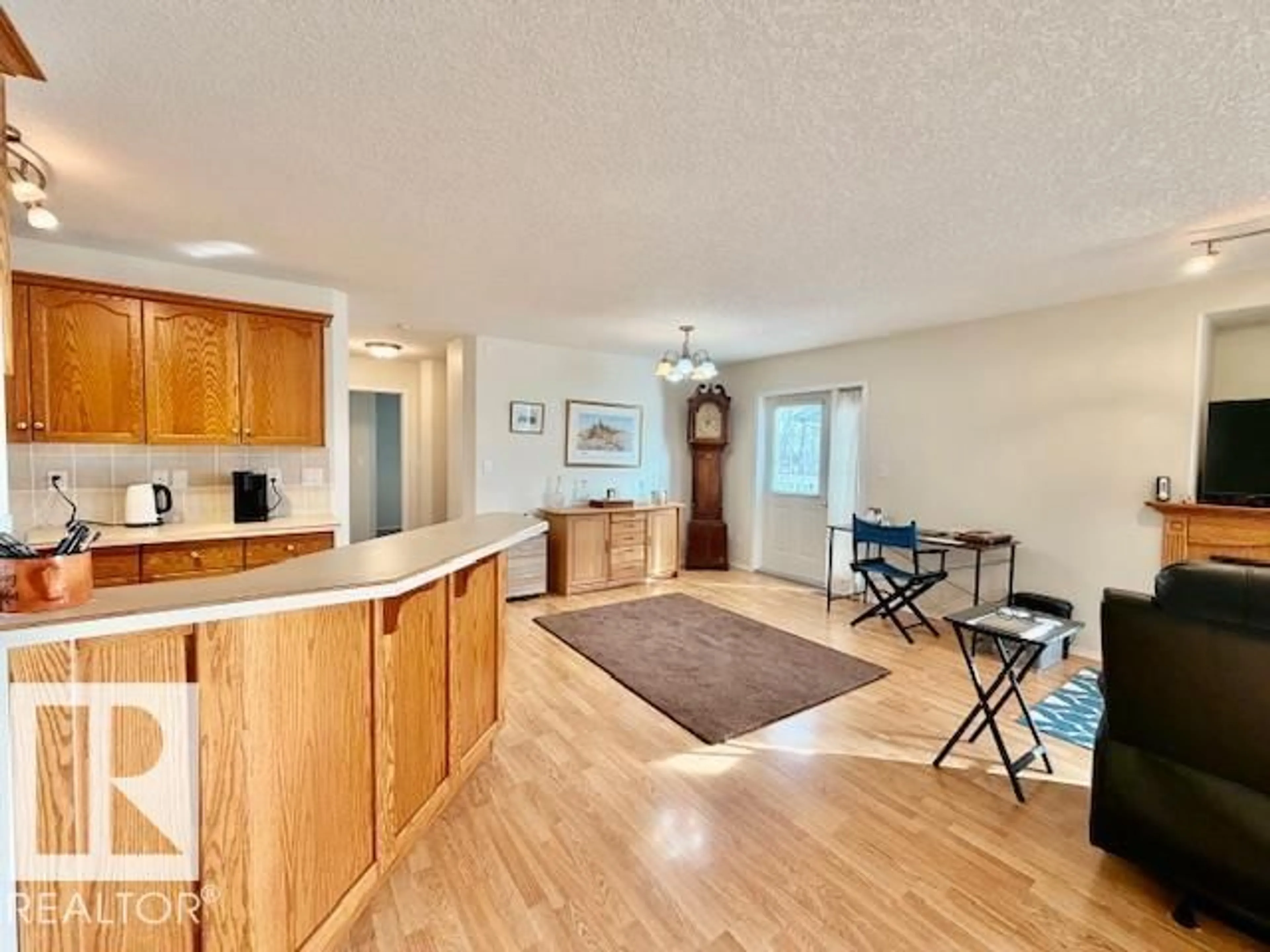 Open concept kitchen, wood/laminate floor for #123 - 7000 NORTHVIEW DR, Wetaskiwin Alberta T9A3R9