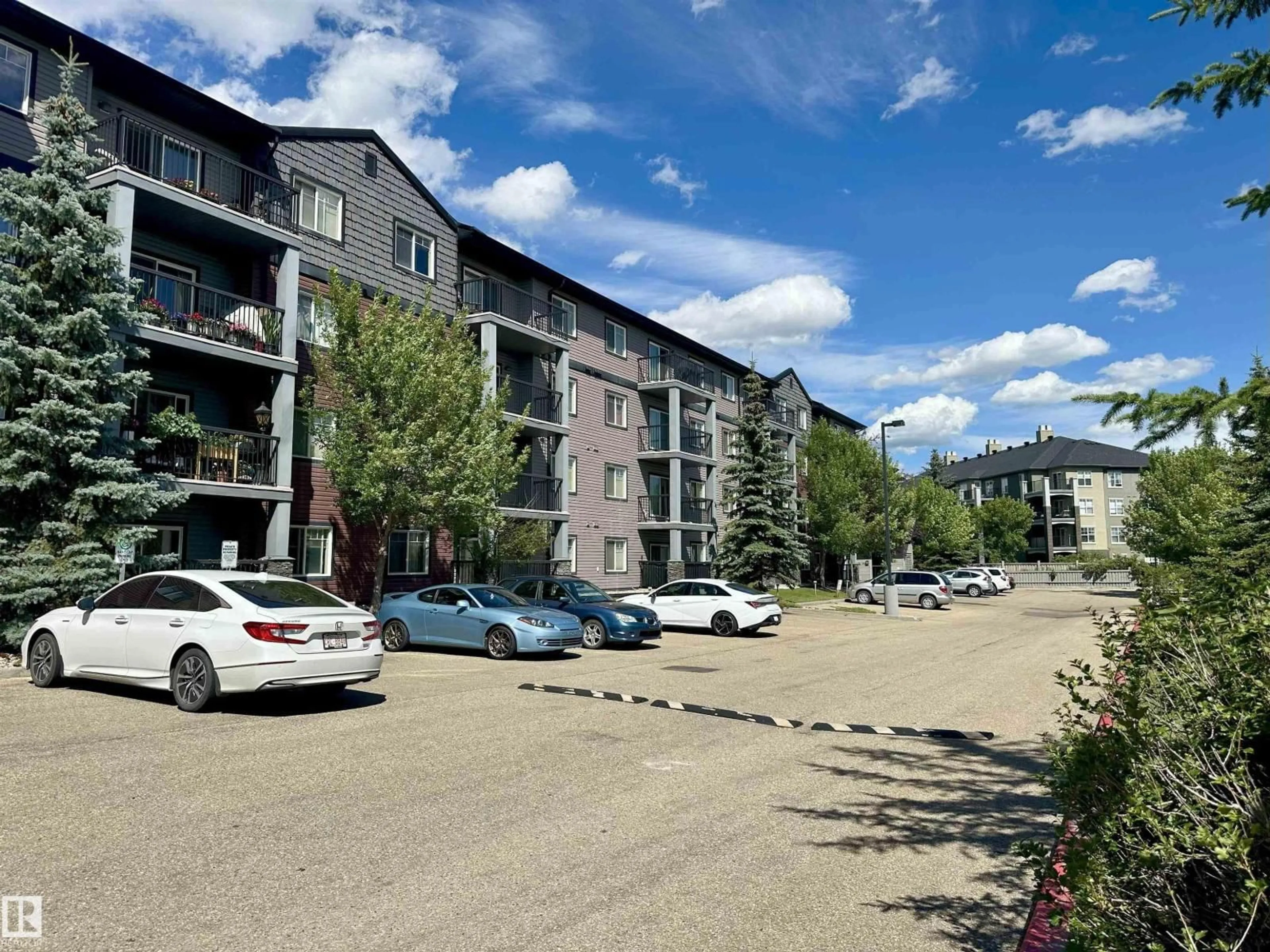 A pic from outside/outdoor area/front of a property/back of a property/a pic from drone, street for 318 - 646 MCALLISTER LO, Edmonton Alberta T6W0B5