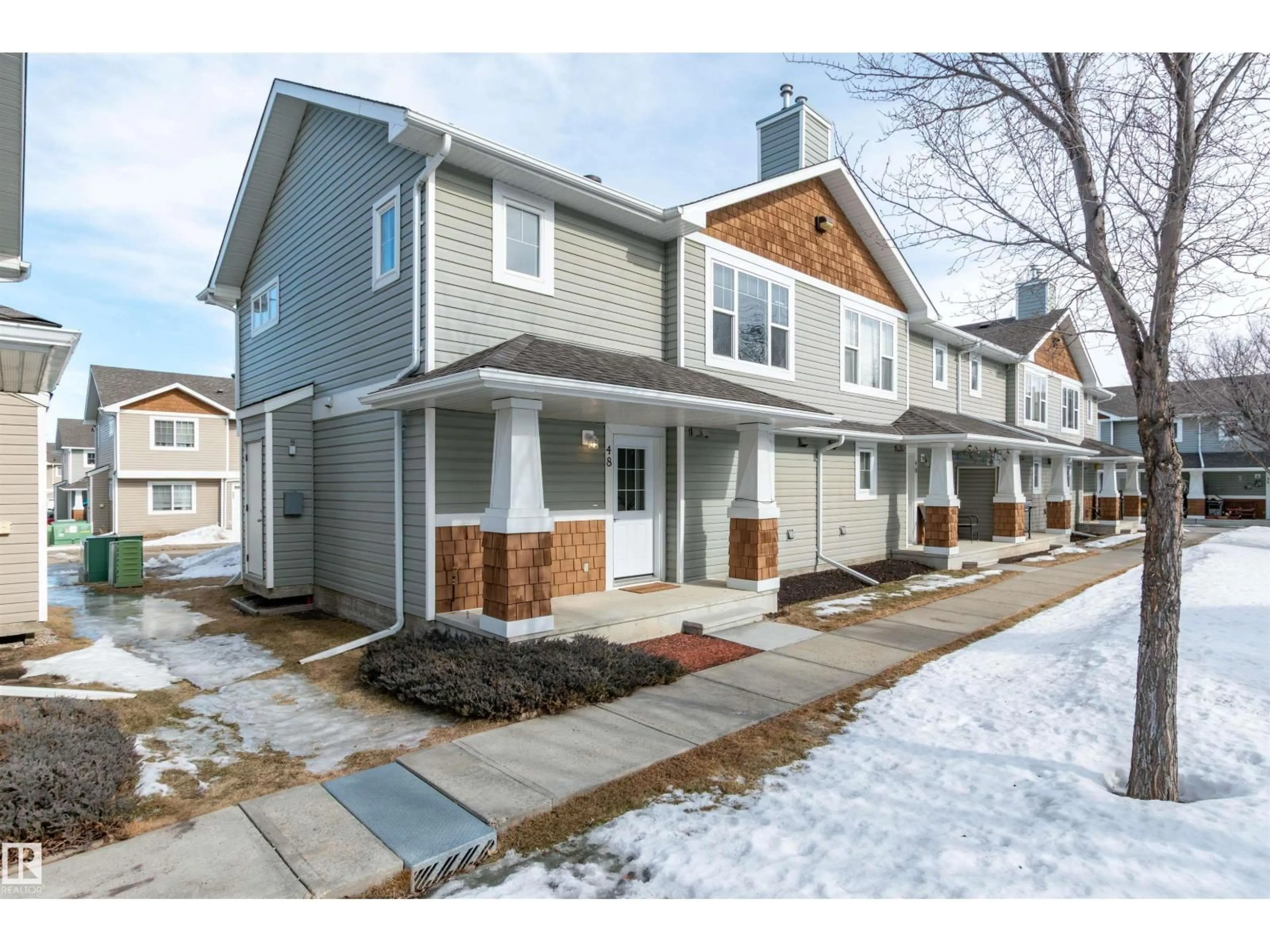 Home with vinyl exterior material, street for 48 CAVAN RD, Sherwood Park Alberta T8H2W9
