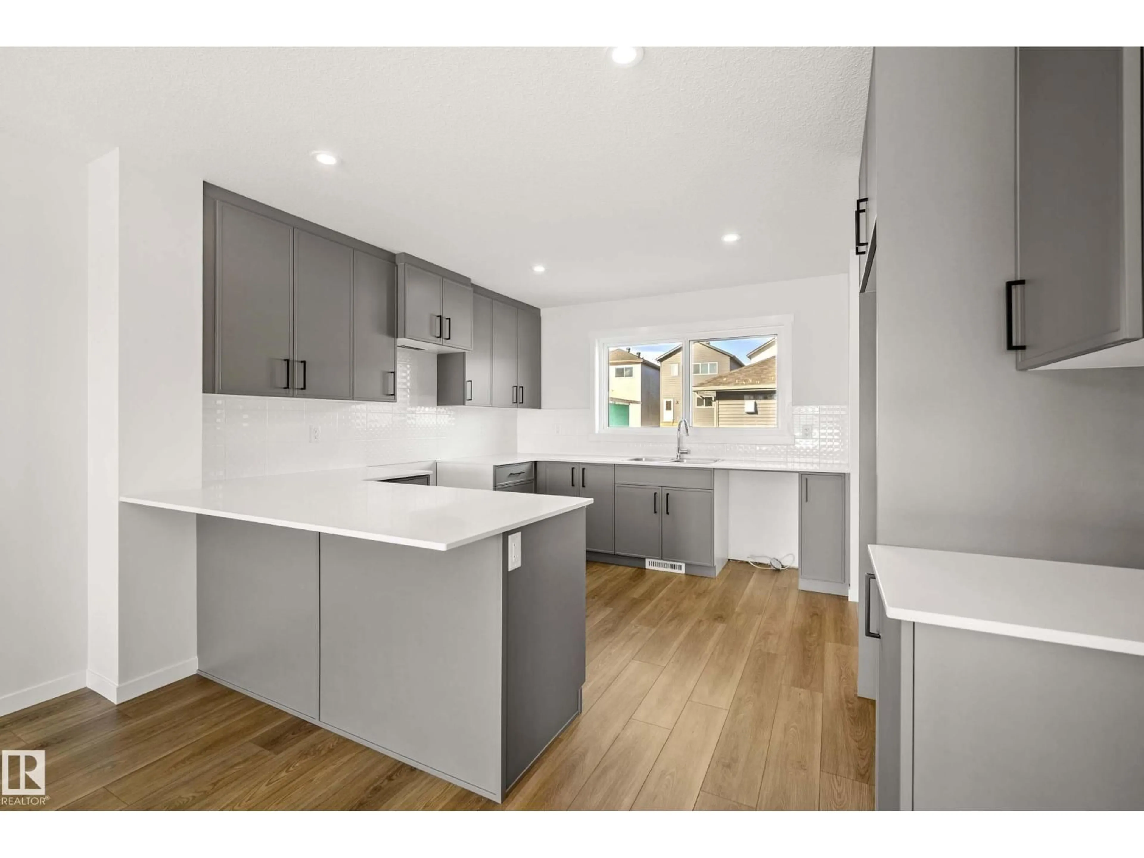 Open concept kitchen, unknown for NW - 17666 69A ST, Edmonton Alberta T5Z0X8