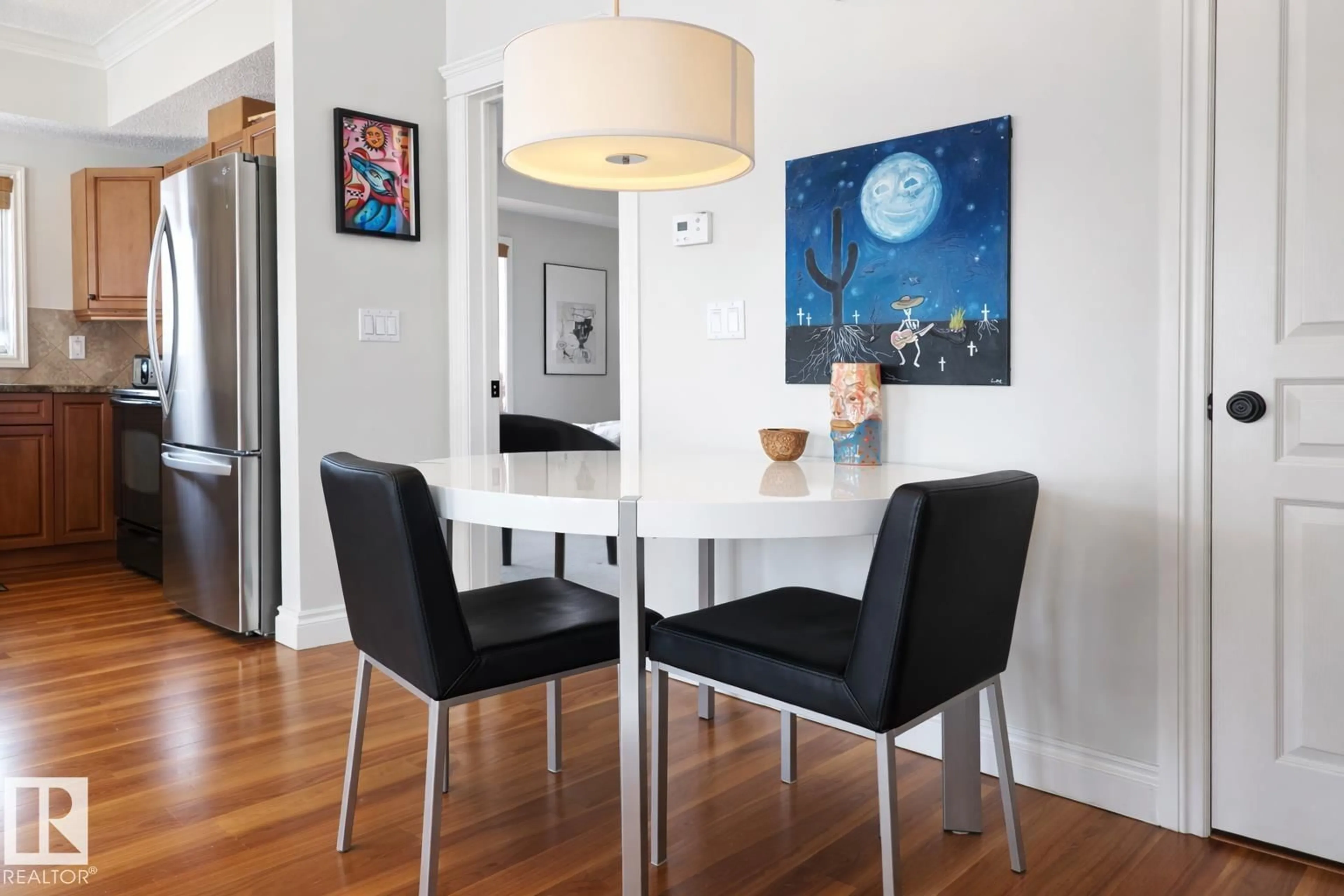 Dining room, wood/laminate floor for #406 - 10232 115 ST, Edmonton Alberta T5K1T8