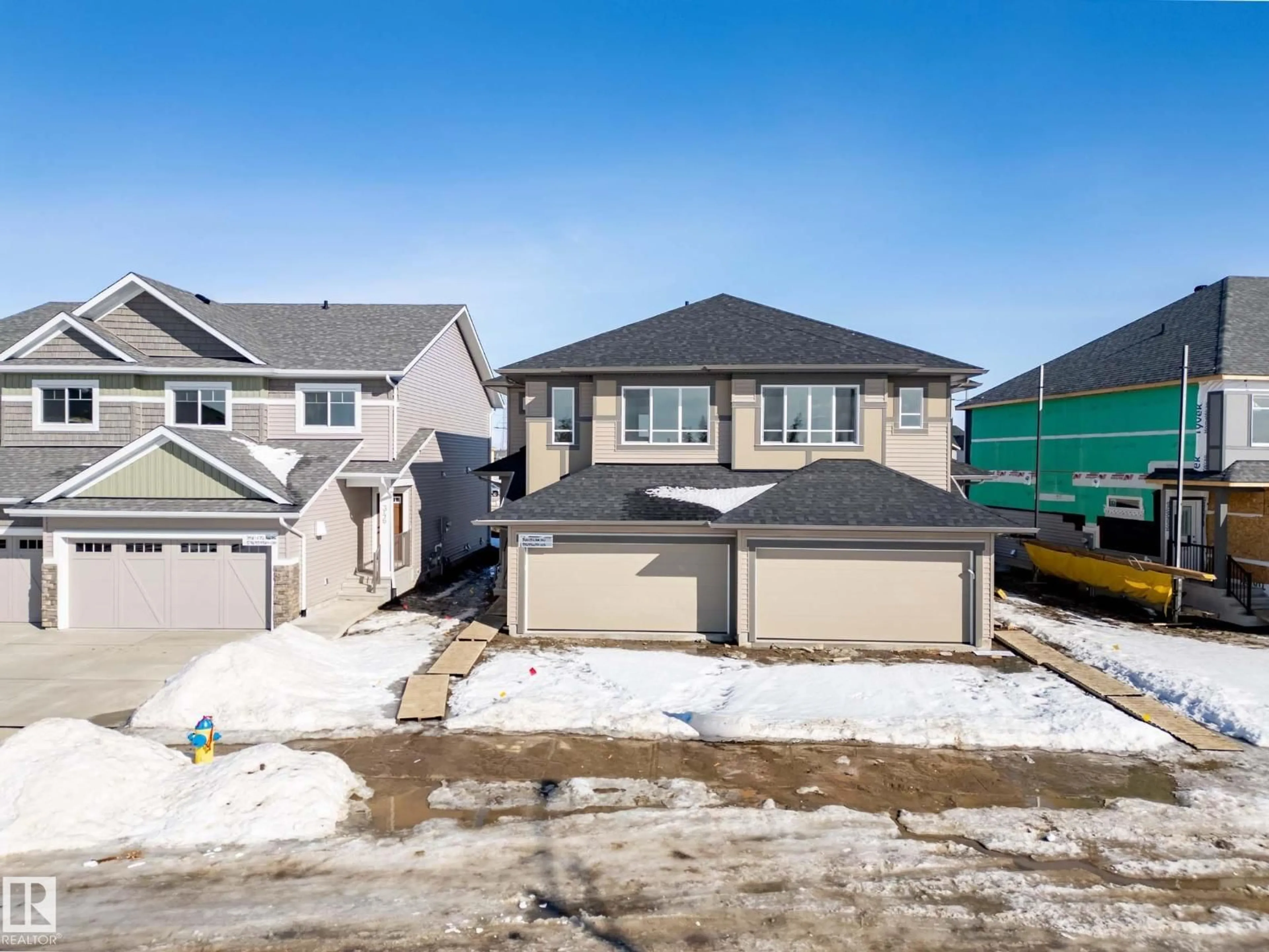 A pic from outside/outdoor area/front of a property/back of a property/a pic from drone, street for 342 172 AV, Edmonton Alberta T5Y4K9