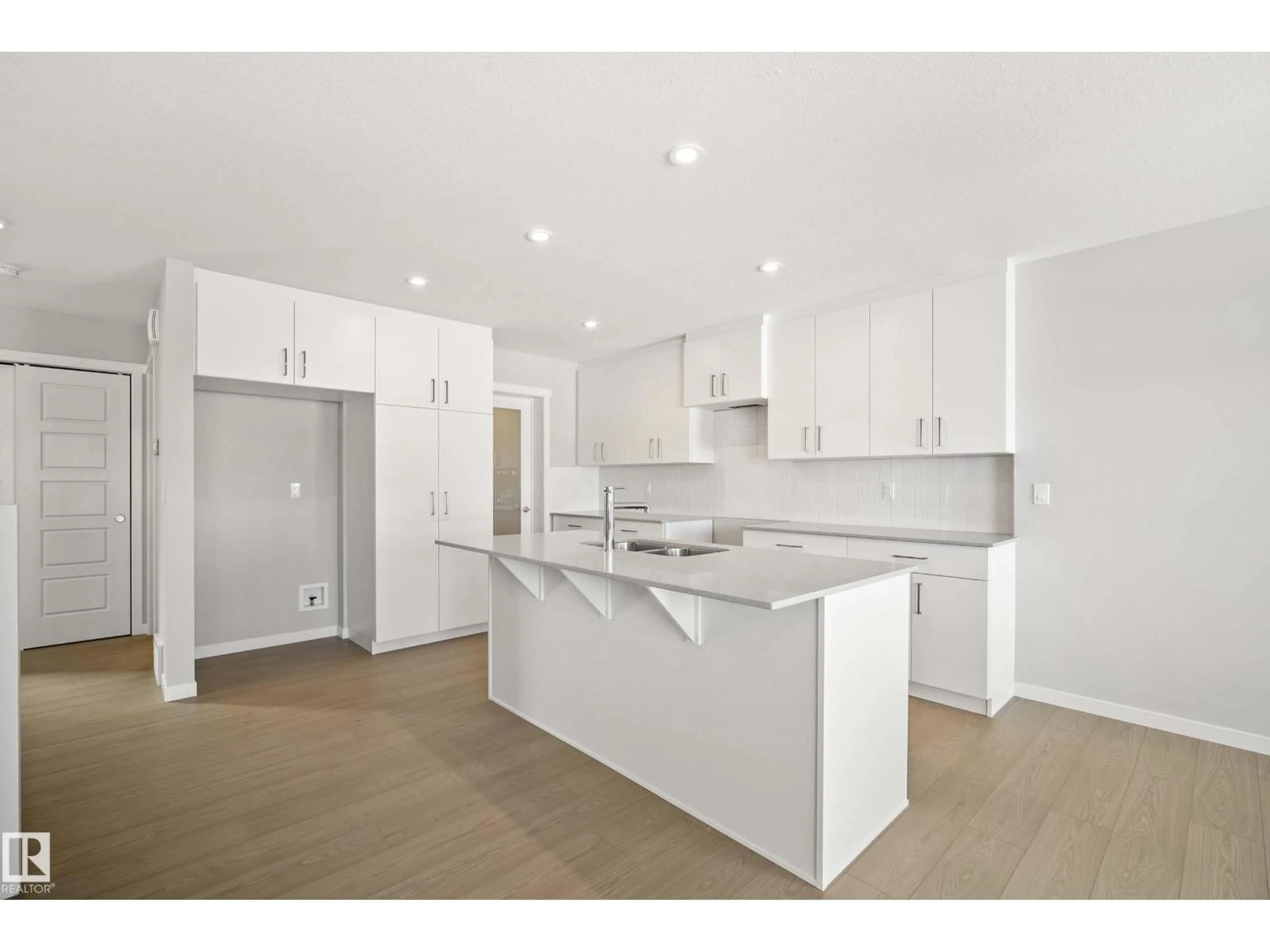 Open concept kitchen, ceramic/tile floor for 342 172 AV, Edmonton Alberta T5Y4K9