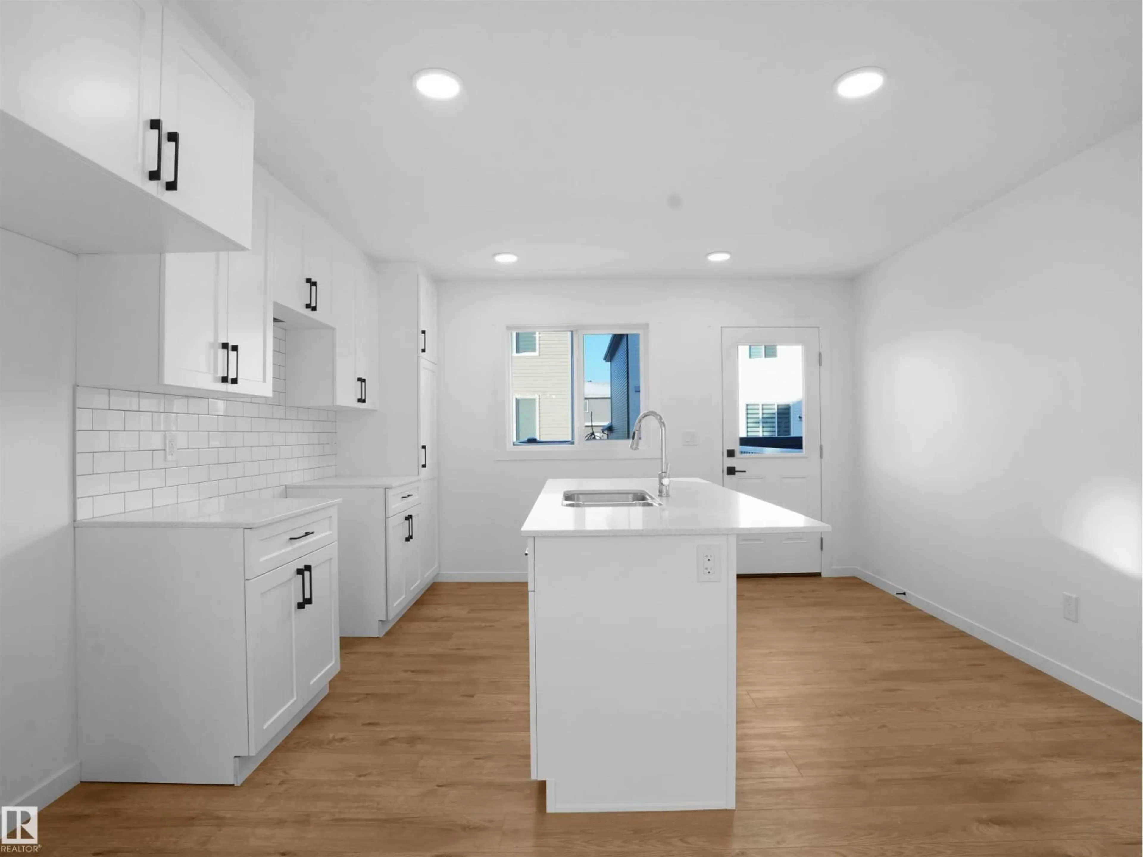 Open concept kitchen, ceramic/tile floor for 32 - 1009 CY BECKER RD, Edmonton Alberta T5Y4B7