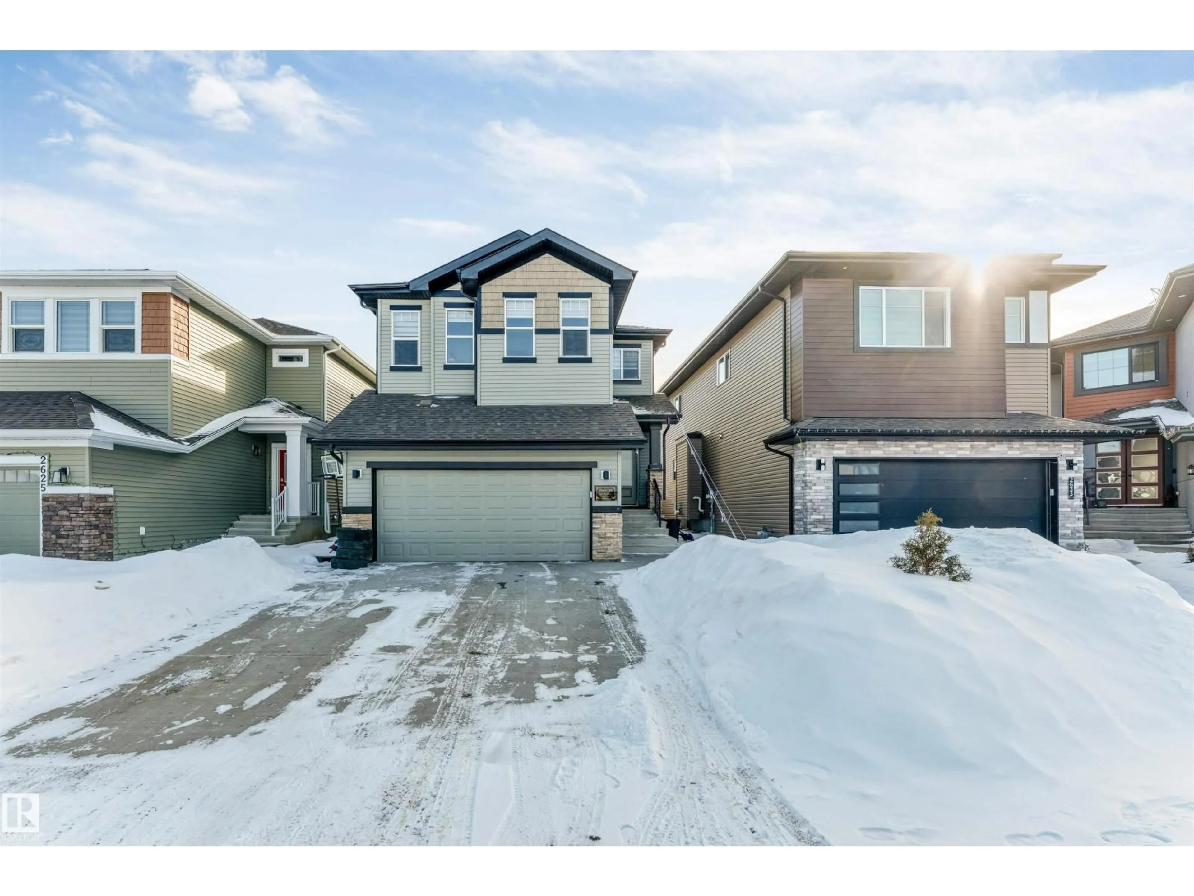 A pic from outside/outdoor area/front of a property/back of a property/a pic from drone, street for 2629 15A AV, Edmonton Alberta T6T2T7