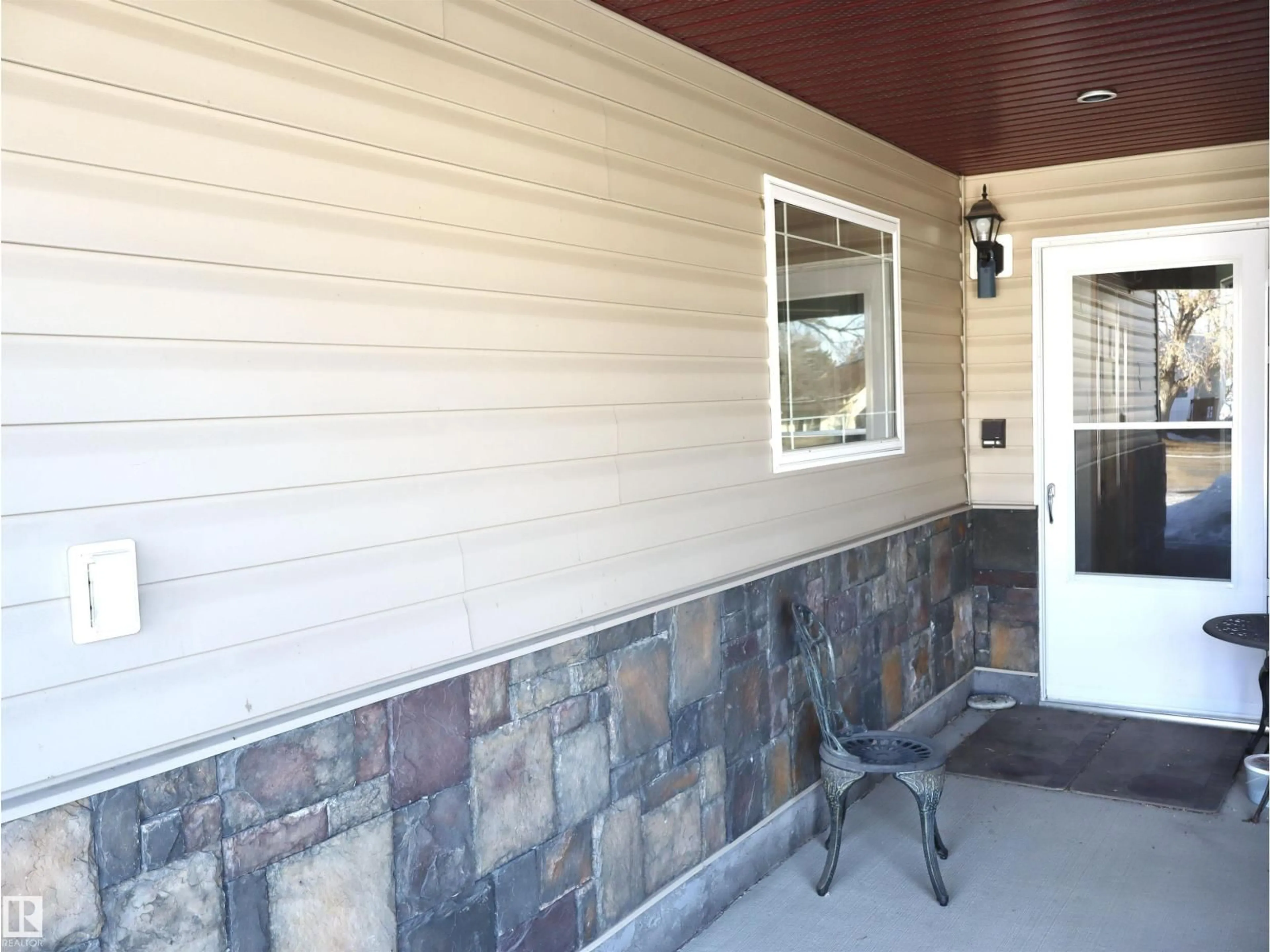 Home with vinyl exterior material, building for 4617B 51 AVE, Barrhead Alberta T7N1H5