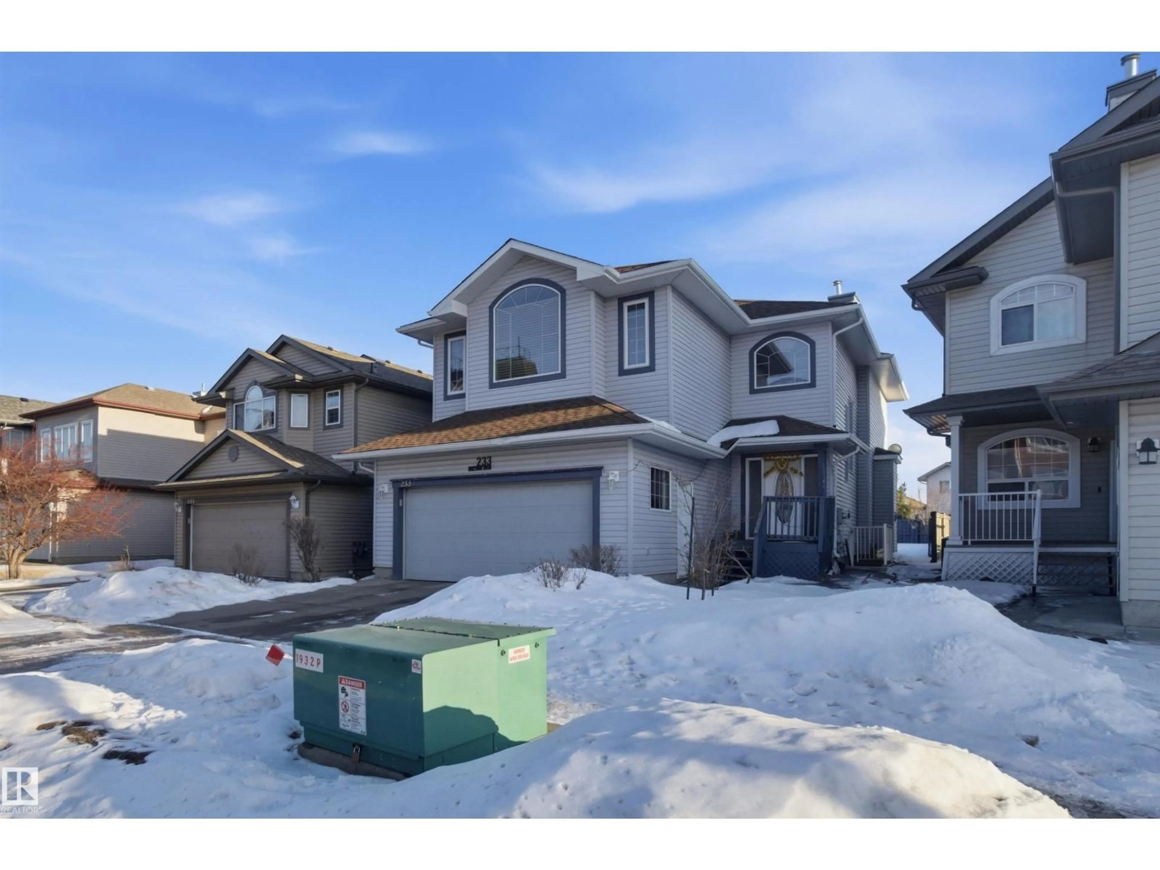 A pic from outside/outdoor area/front of a property/back of a property/a pic from drone, street for 233 MACEWAN RD, Edmonton Alberta T6W1R3