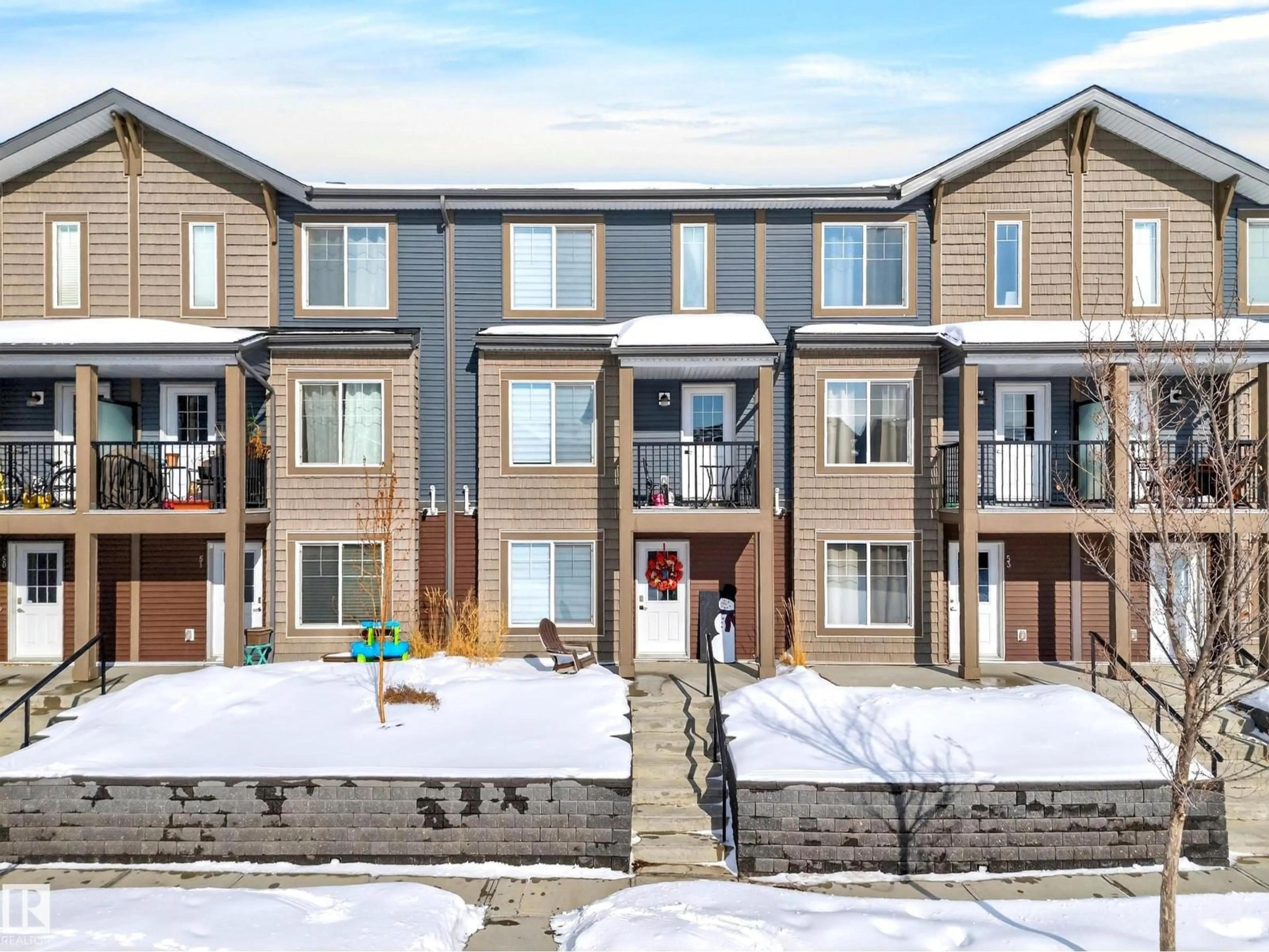 A pic from outside/outdoor area/front of a property/back of a property/a pic from drone, street for 52 - 3025 151 AV, Edmonton Alberta T5Y3X4