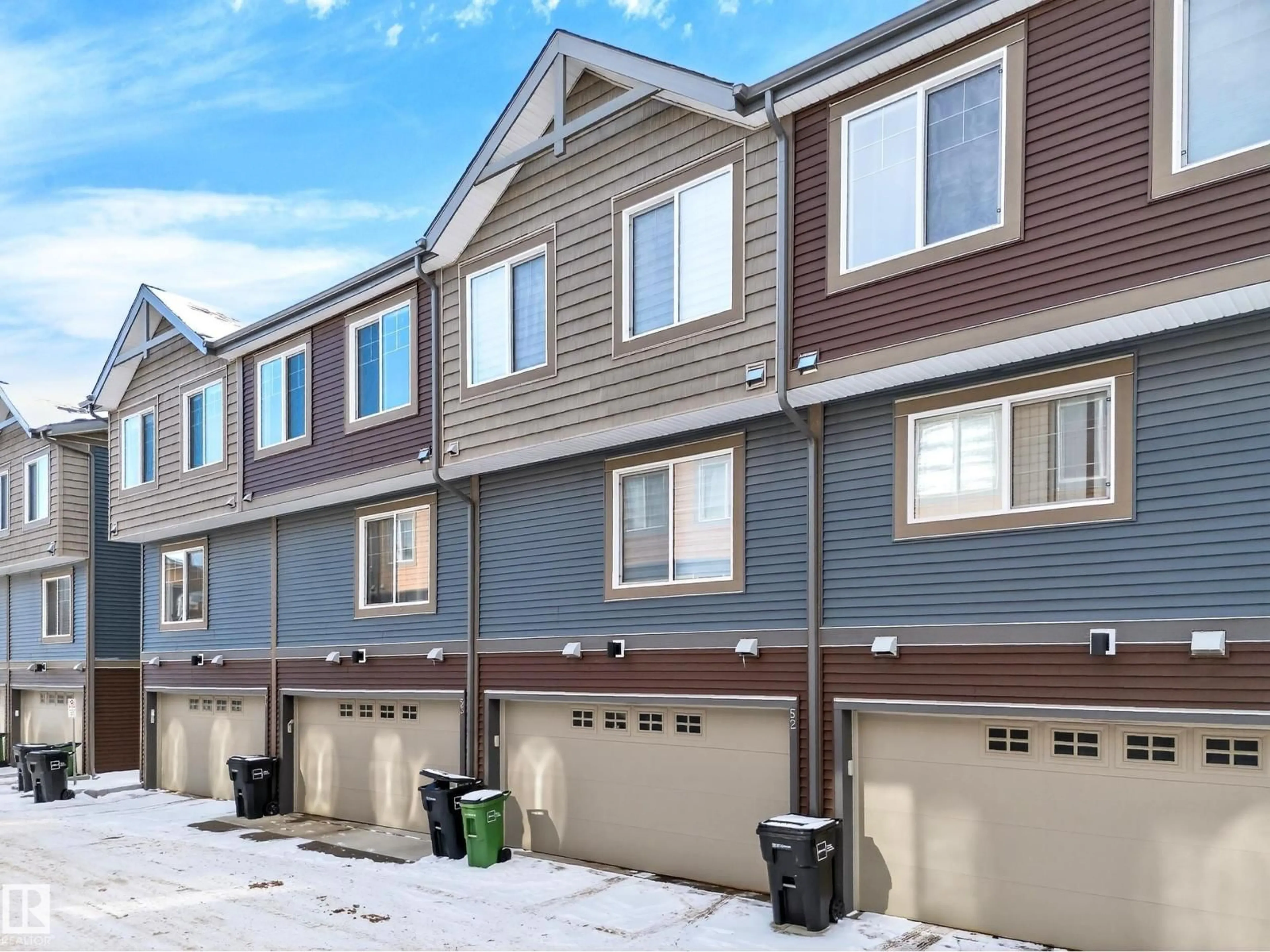 Home with vinyl exterior material, street for 52 - 3025 151 AV, Edmonton Alberta T5Y3X4