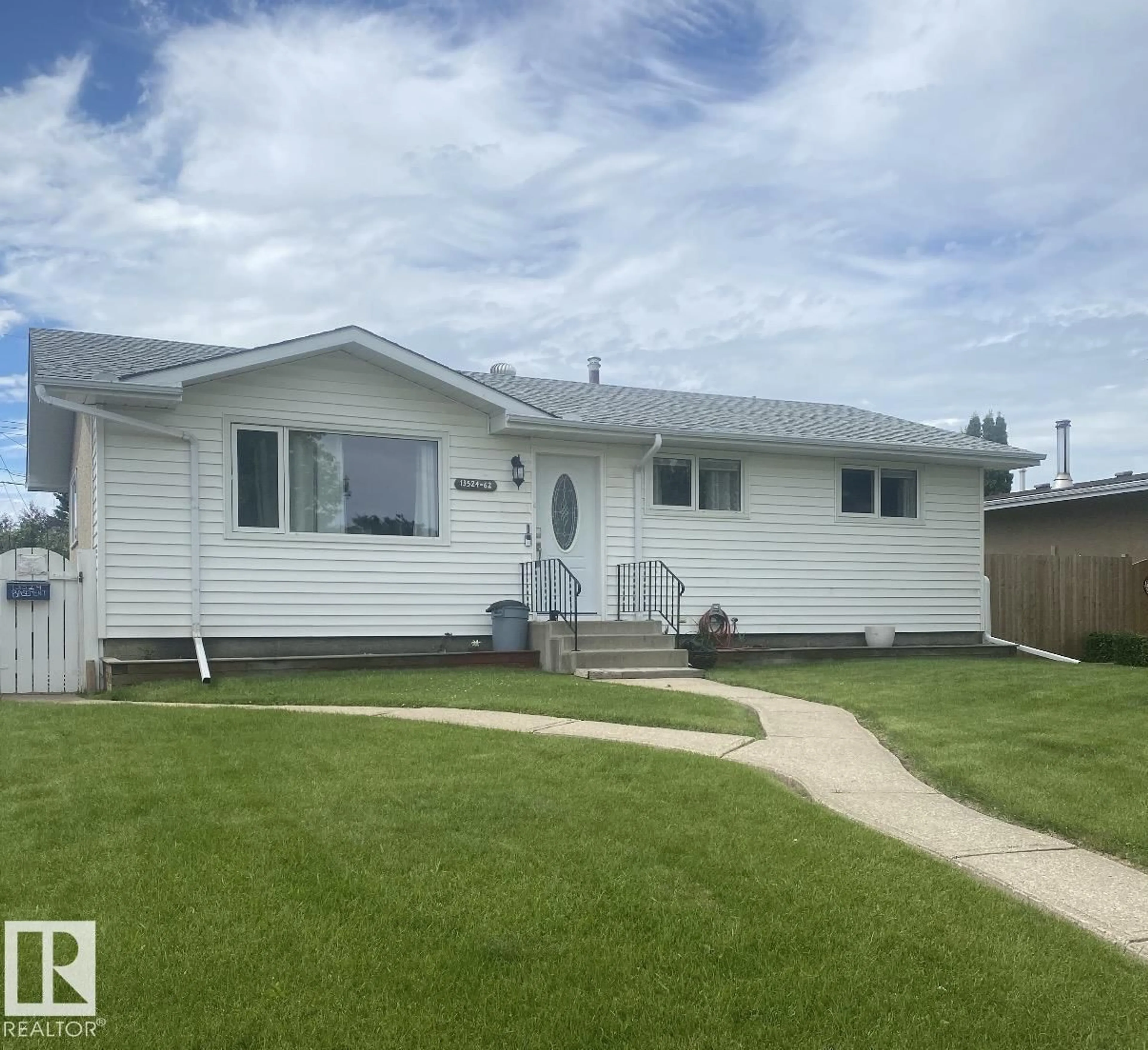 Home with vinyl exterior material, street for NW - 13524 62 ST, Edmonton Alberta T5A0V9