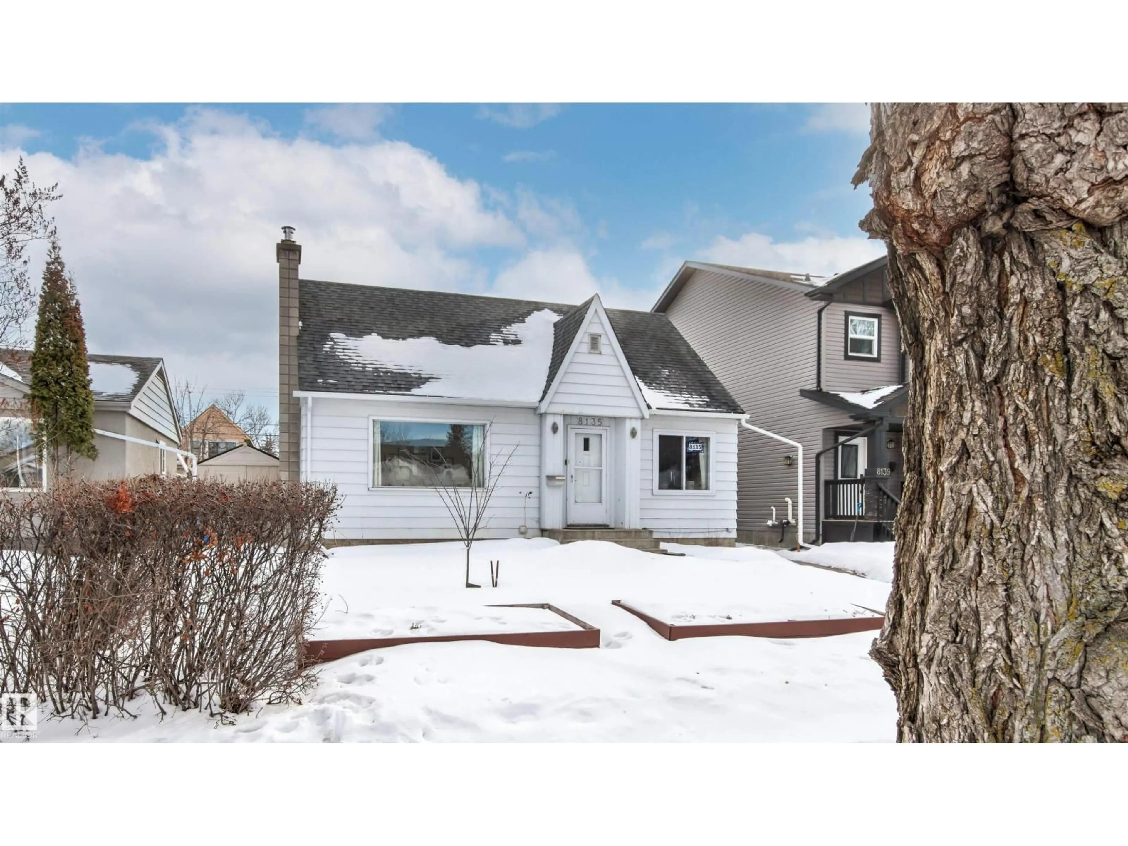 Home with vinyl exterior material, street for 8135 78 AV, Edmonton Alberta T6C0N3