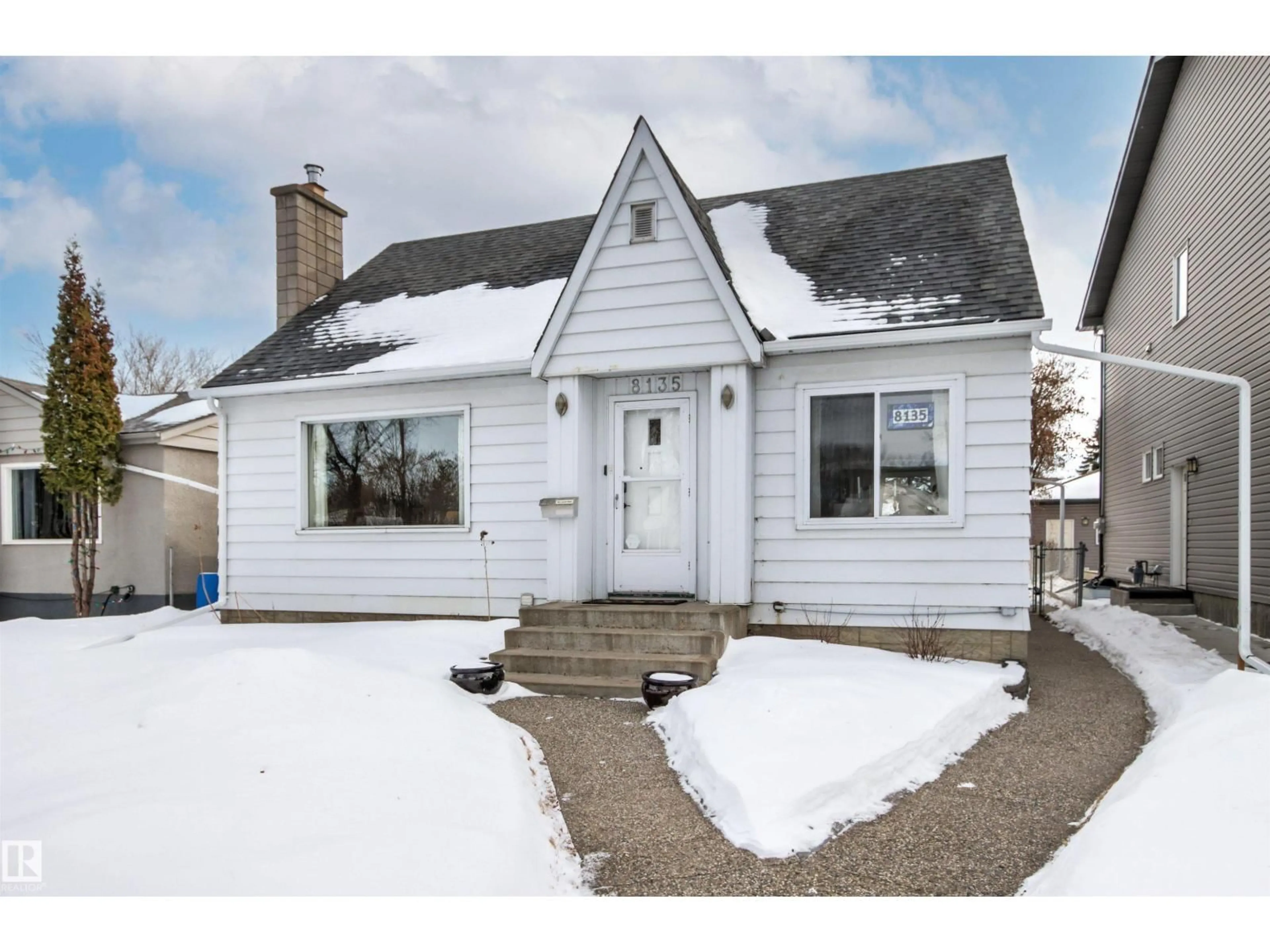 Home with vinyl exterior material, street for 8135 78 AV, Edmonton Alberta T6C0N3