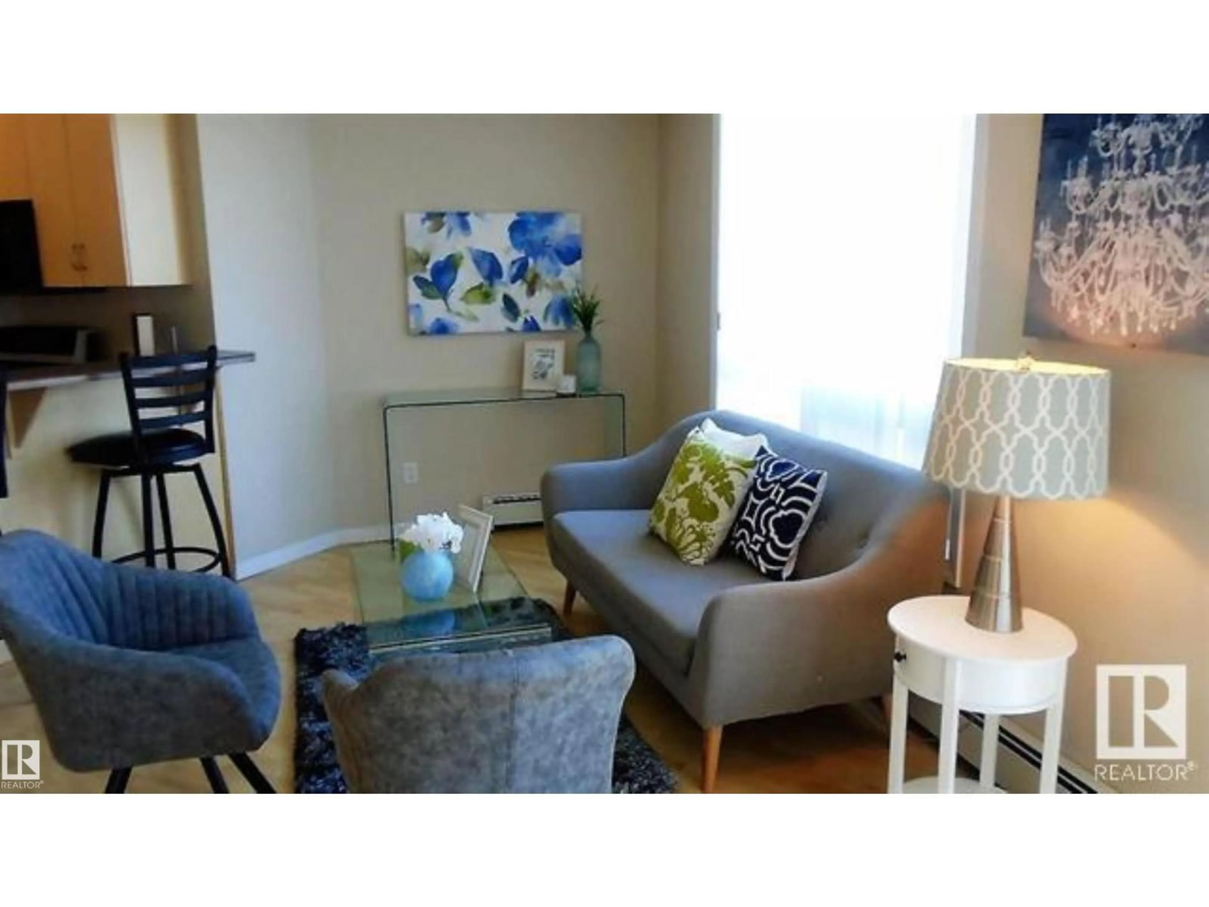 Living room with furniture, wood/laminate floor for #902 - 10504 99 AV, Edmonton Alberta T5K1B2