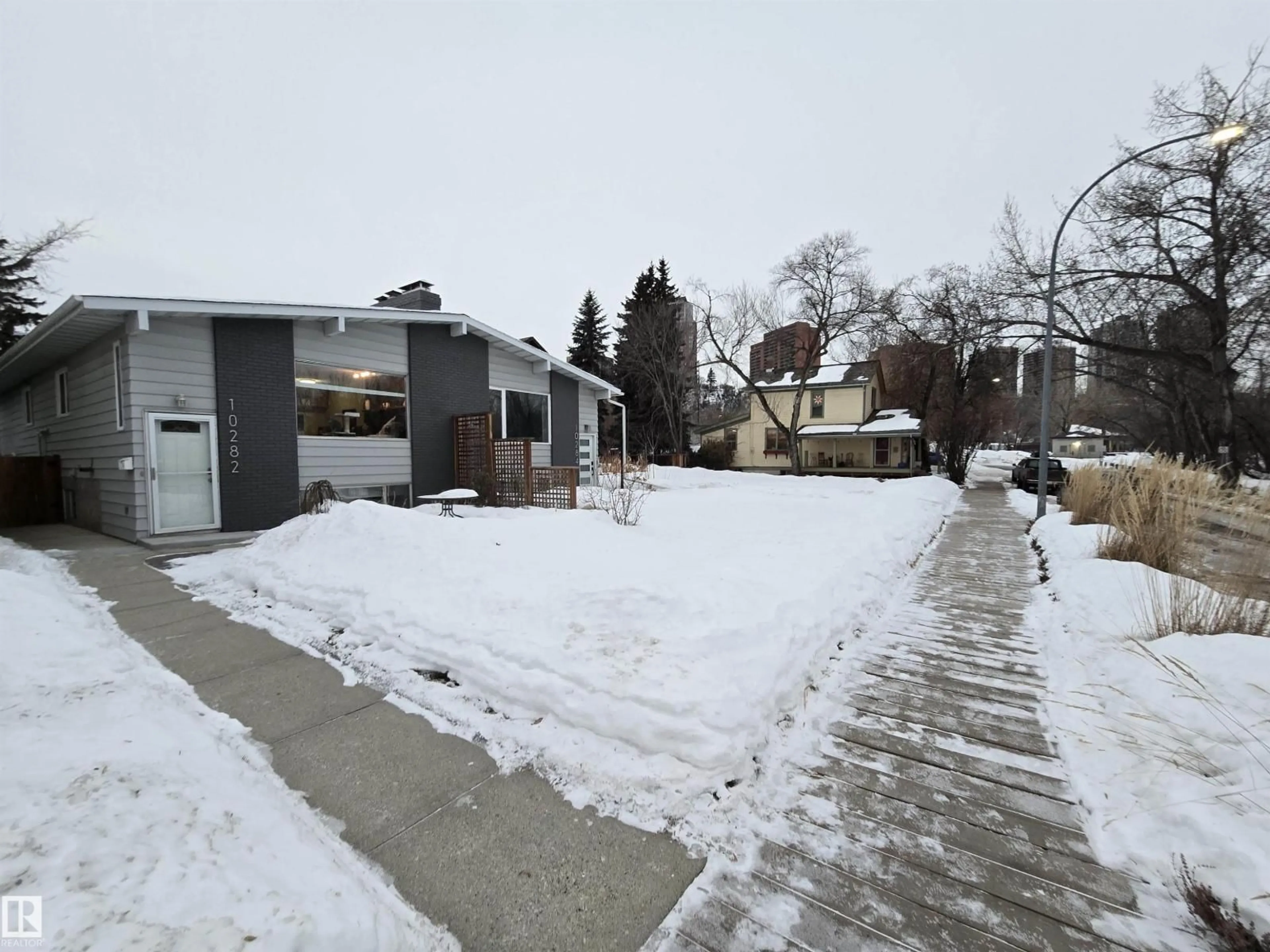 A pic from outside/outdoor area/front of a property/back of a property/a pic from drone, street for NW - 10282 87 ST, Edmonton Alberta T5H1N6