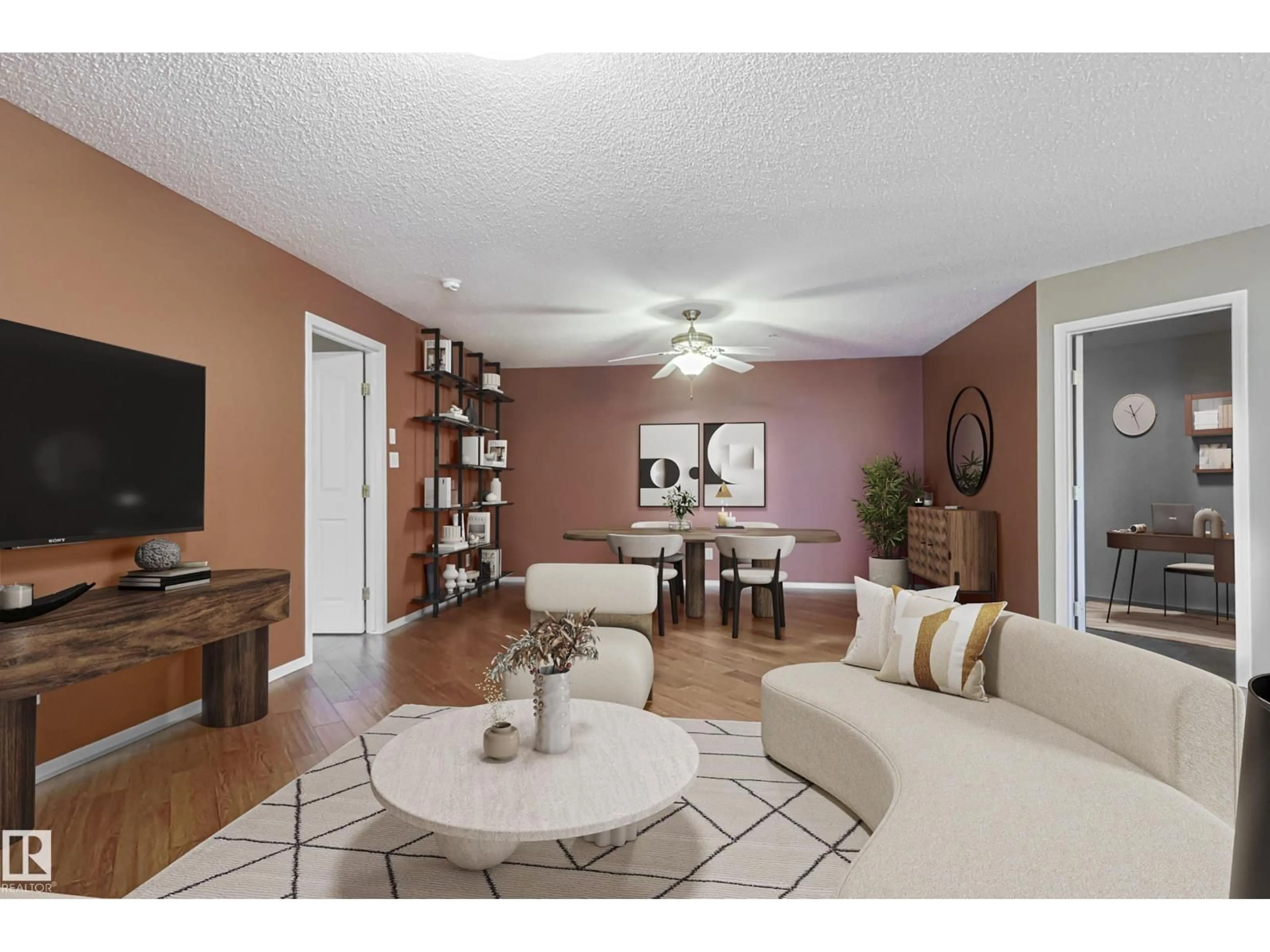 Living room with furniture, wood/laminate floor for 100 - 314 FOXHAVEN DR, Sherwood Park Alberta T8A6B6