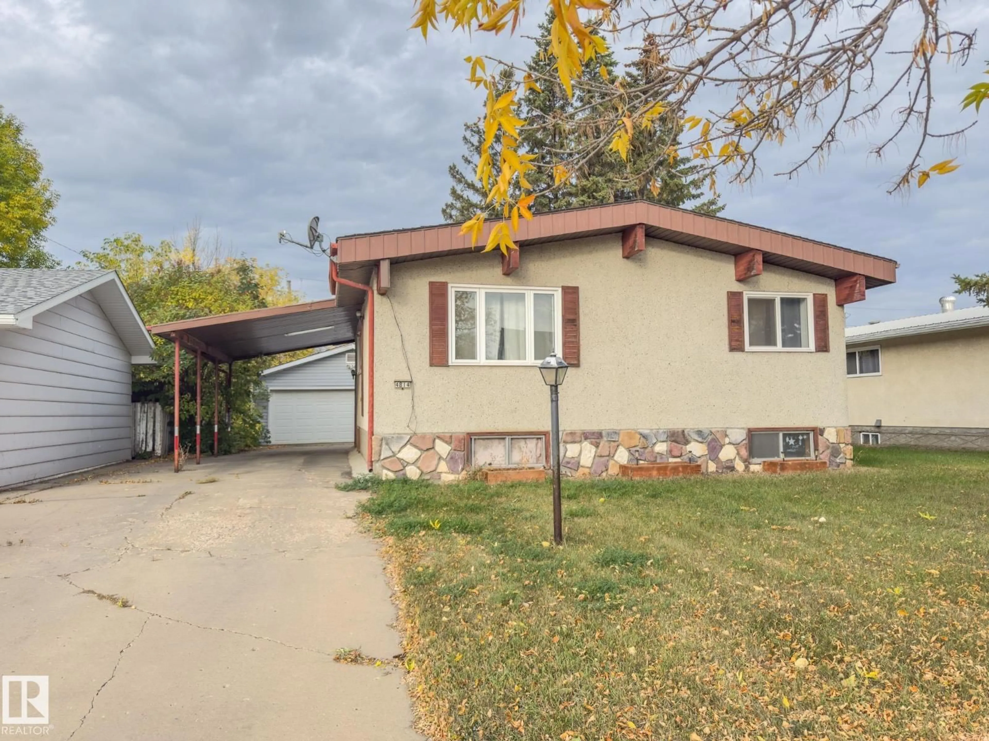 Home with vinyl exterior material, street for 4814 53 ST, Bonnyville Town Alberta T9N1X8