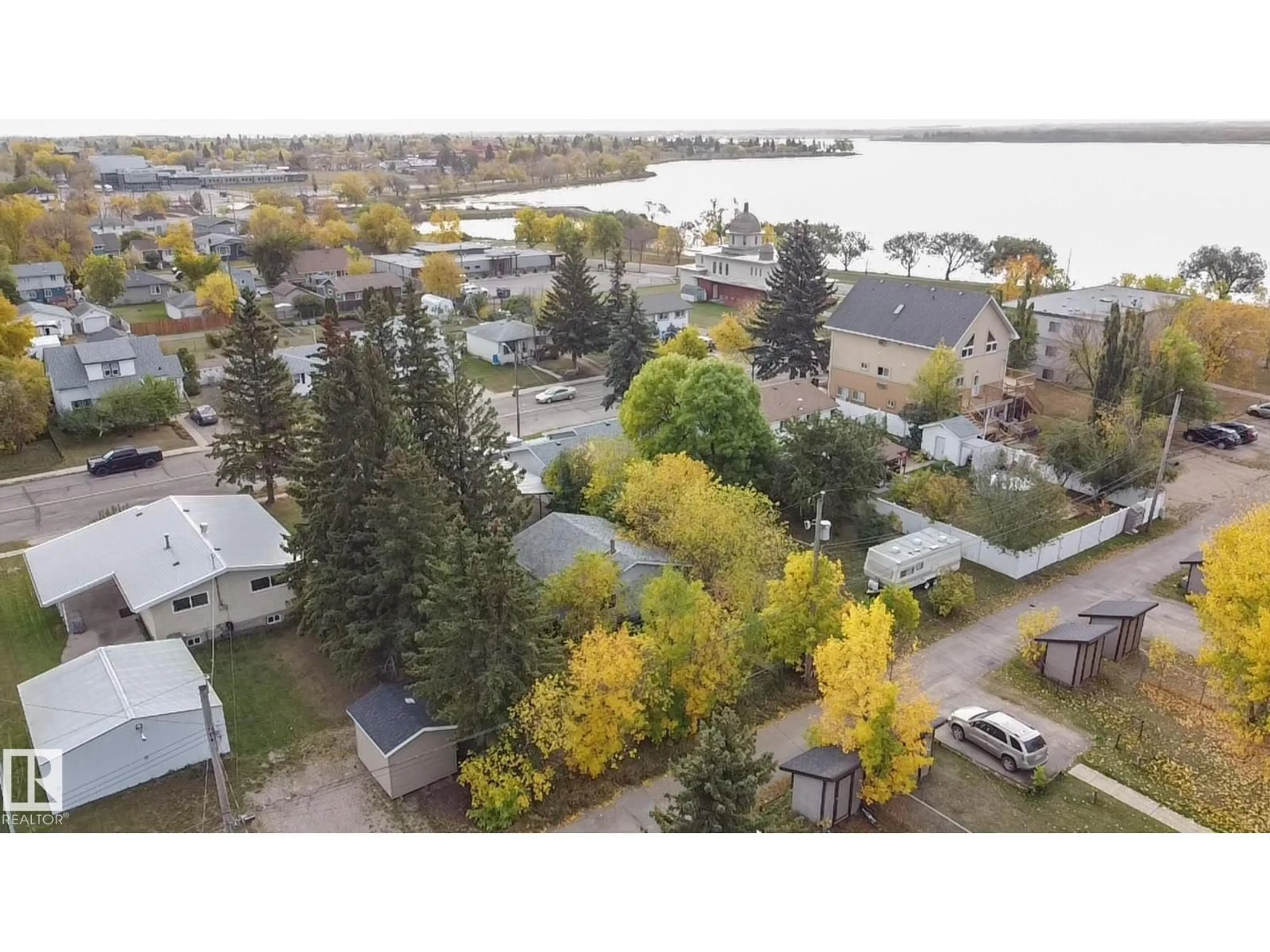 A pic from outside/outdoor area/front of a property/back of a property/a pic from drone, water/lake/river/ocean view for 4814 53 ST, Bonnyville Town Alberta T9N1X8