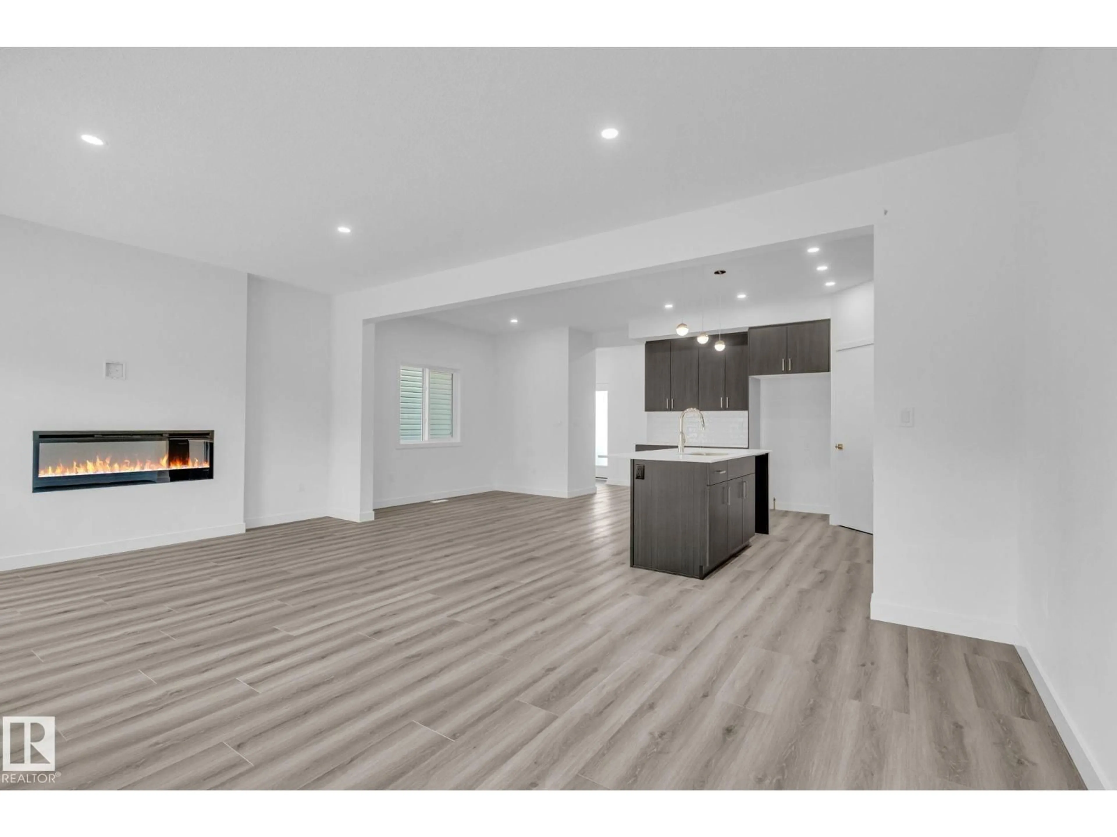 Open concept kitchen, wood/laminate floor for 108 ROYAL STREET, St. Albert Alberta T8N7X4