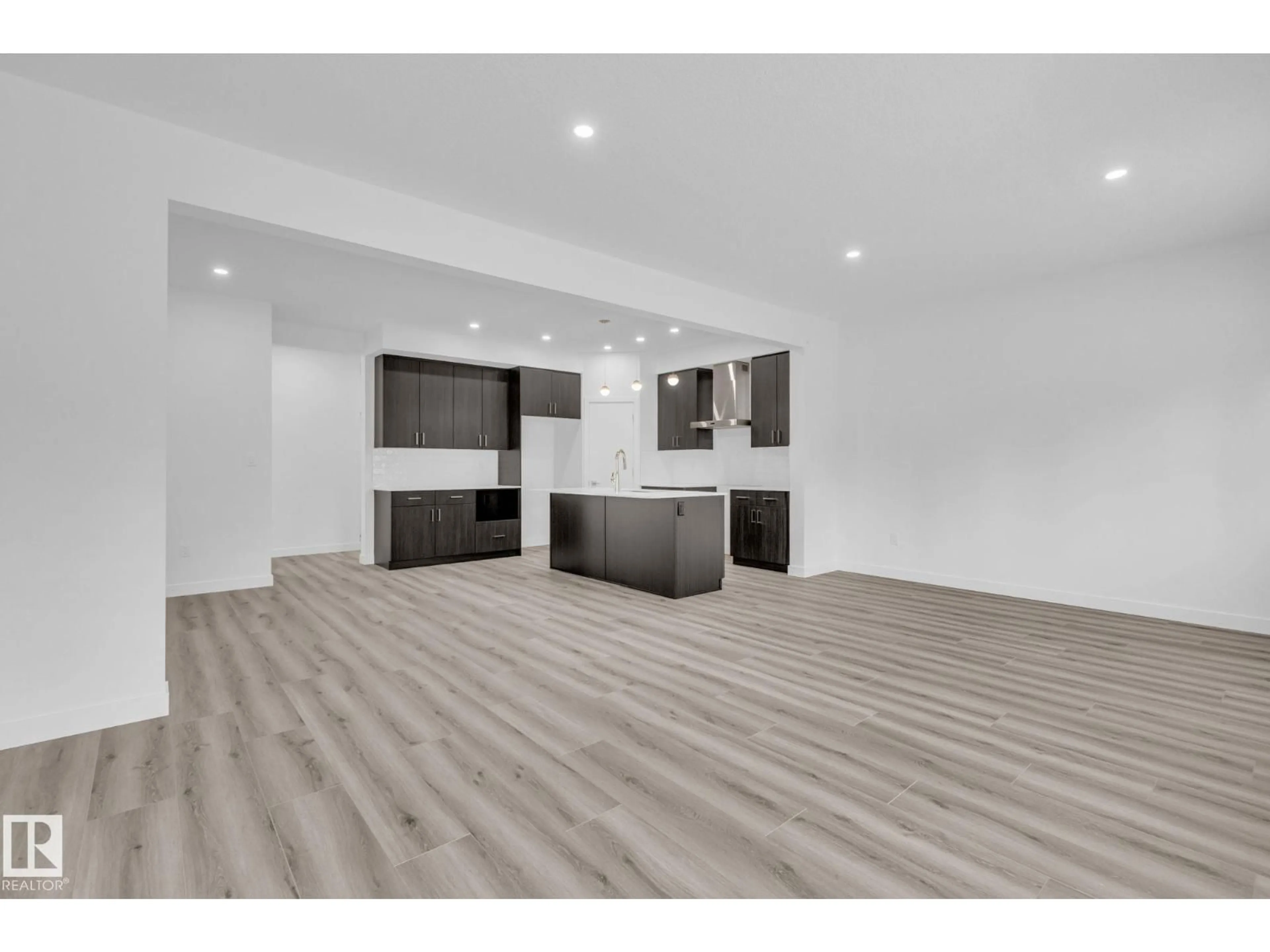 Open concept kitchen, wood/laminate floor for 108 ROYAL STREET, St. Albert Alberta T8N7X4