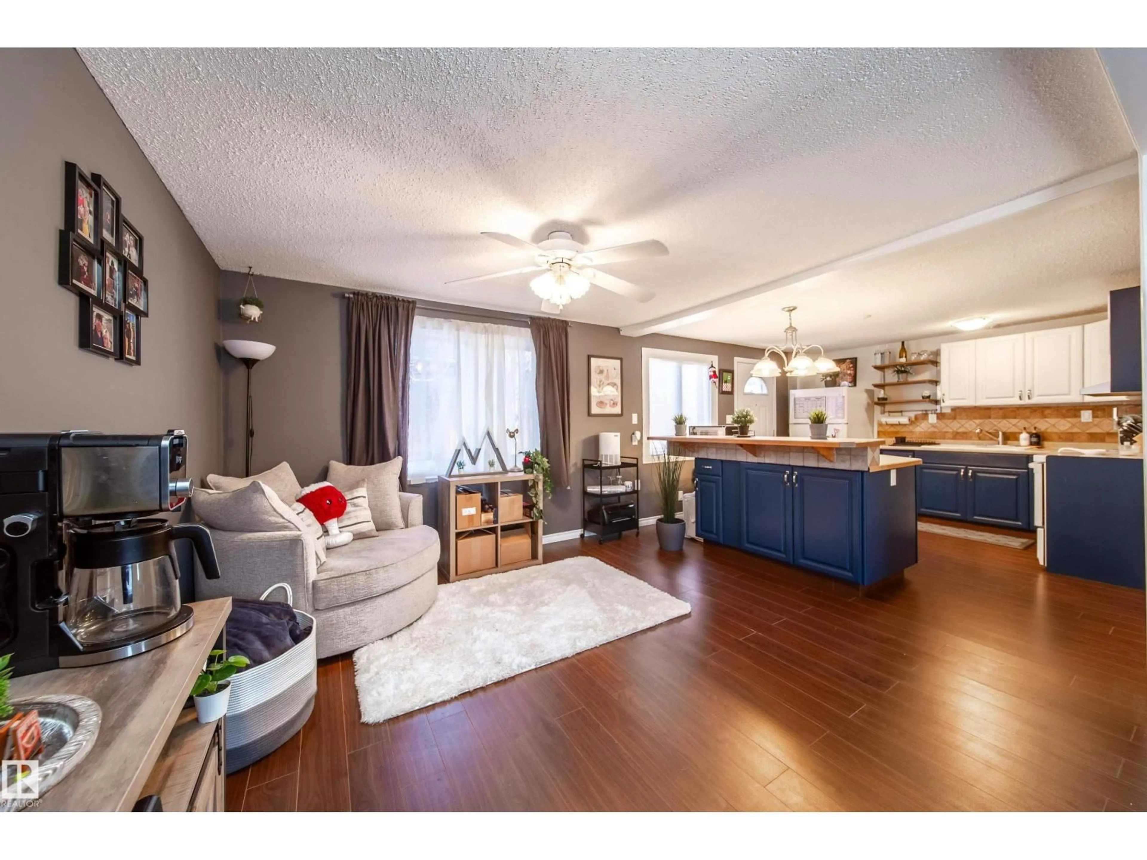 Open concept kitchen, wood/laminate floor for 72 RIDGEWOOD, St. Albert Alberta T8N0E9