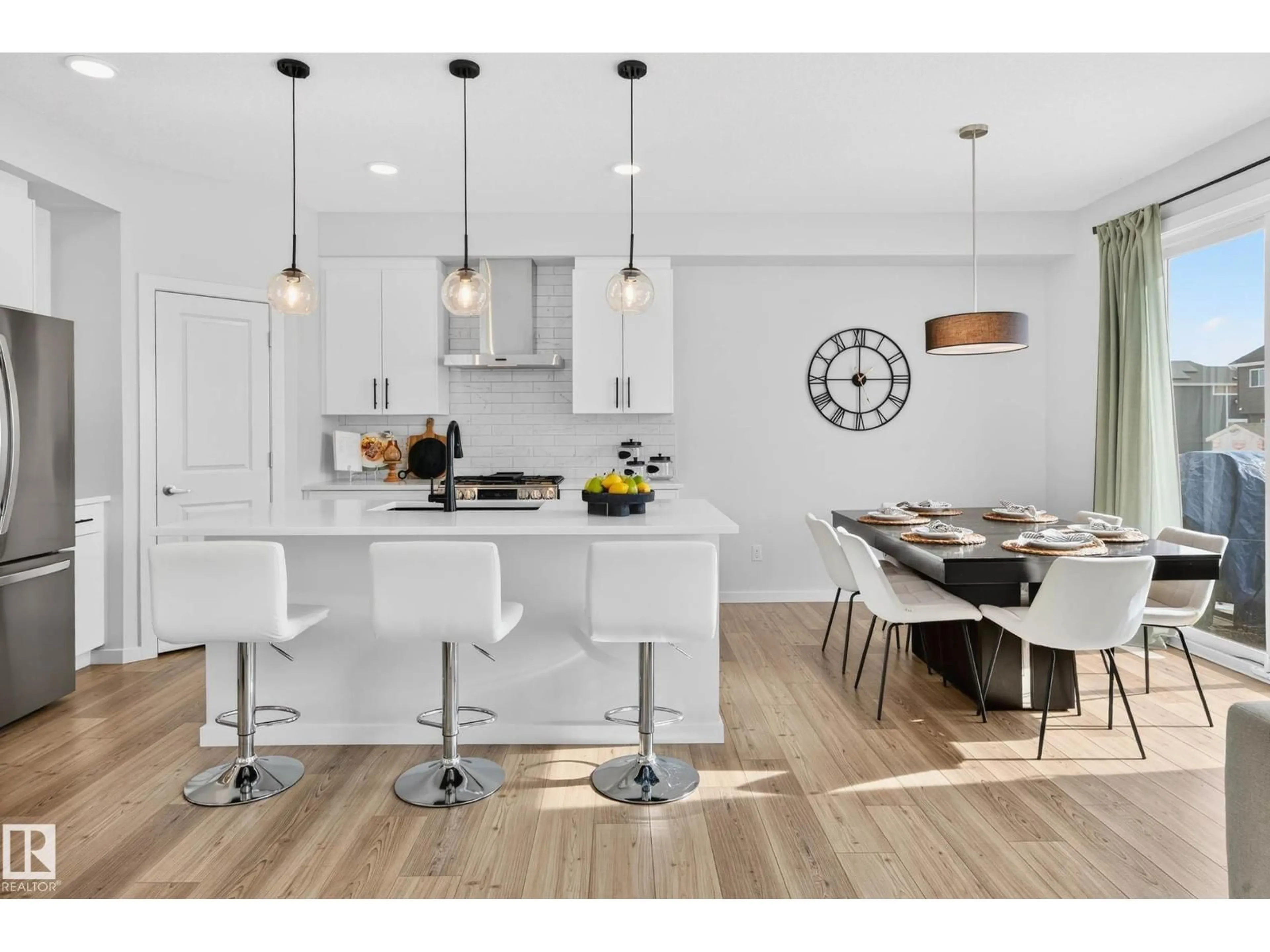 Open concept kitchen, wood/laminate floor for 324 STILES WY, Leduc Alberta T9E1V4