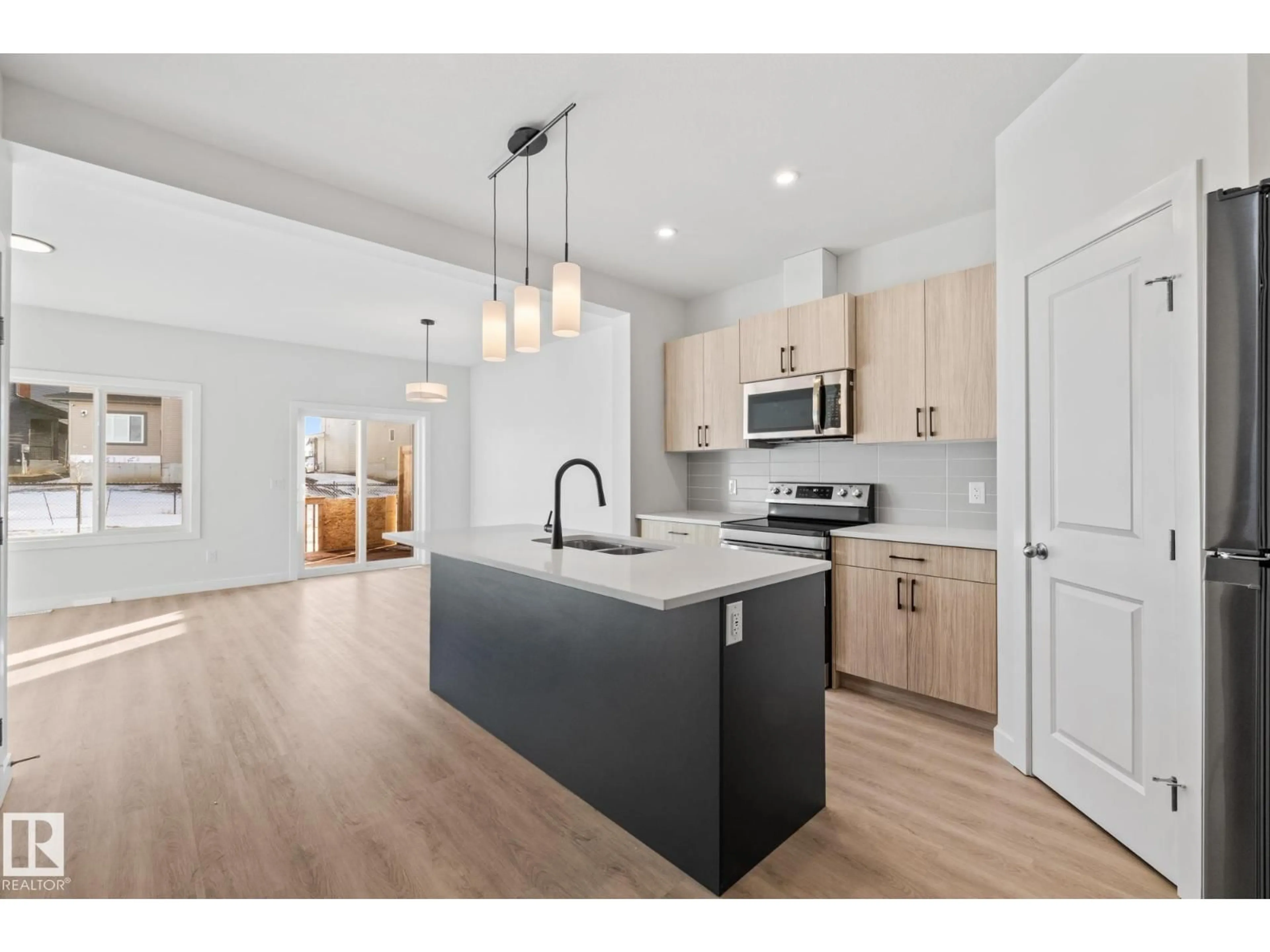 Open concept kitchen, unknown for 144 HONEYSUCKLE GR, Leduc Alberta T9E0K1