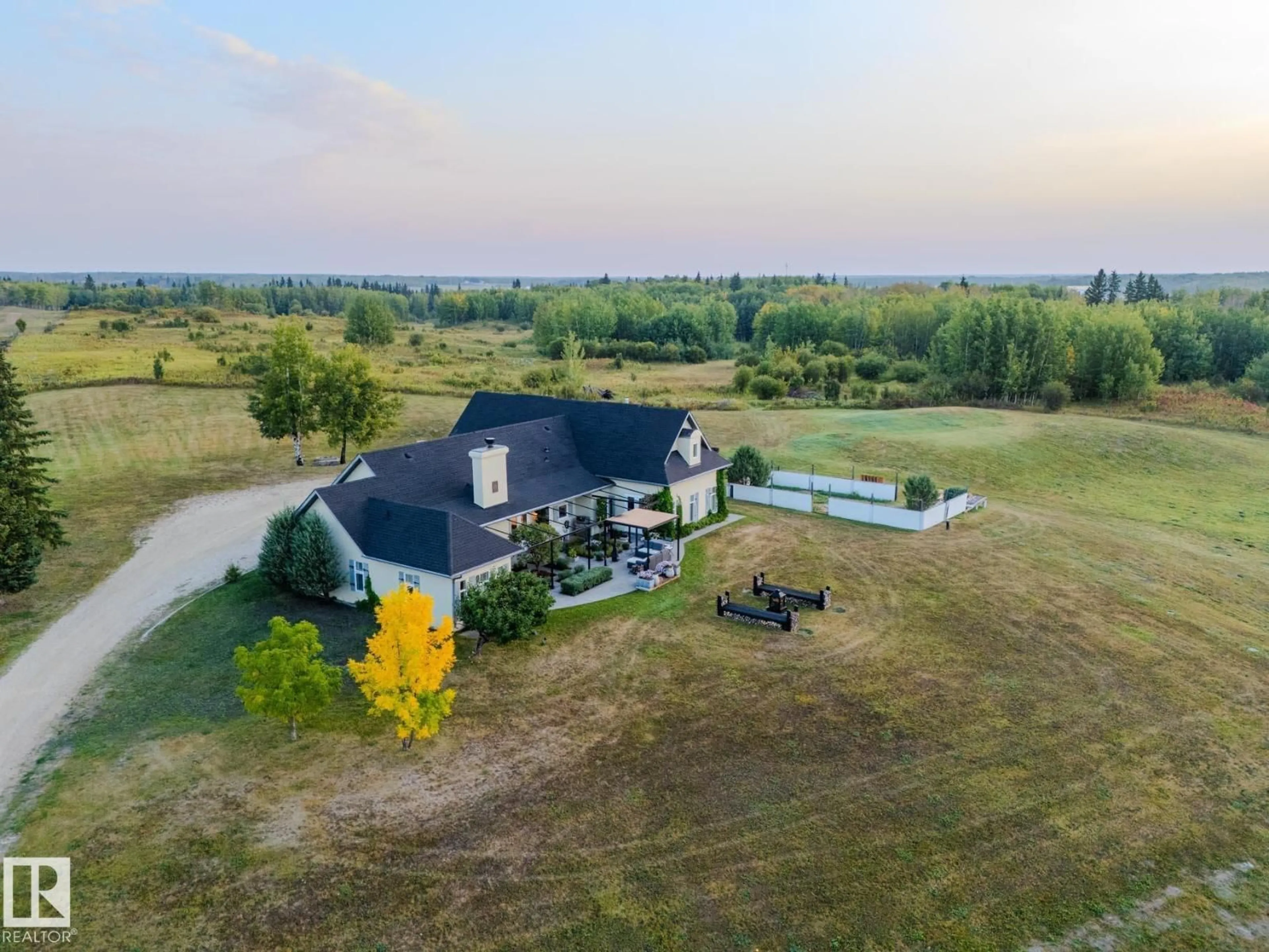 A pic from outside/outdoor area/front of a property/back of a property/a pic from drone, water/lake/river/ocean view for 22250 TWP ROAD 512, Rural Strathcona County Alberta T8C1H2