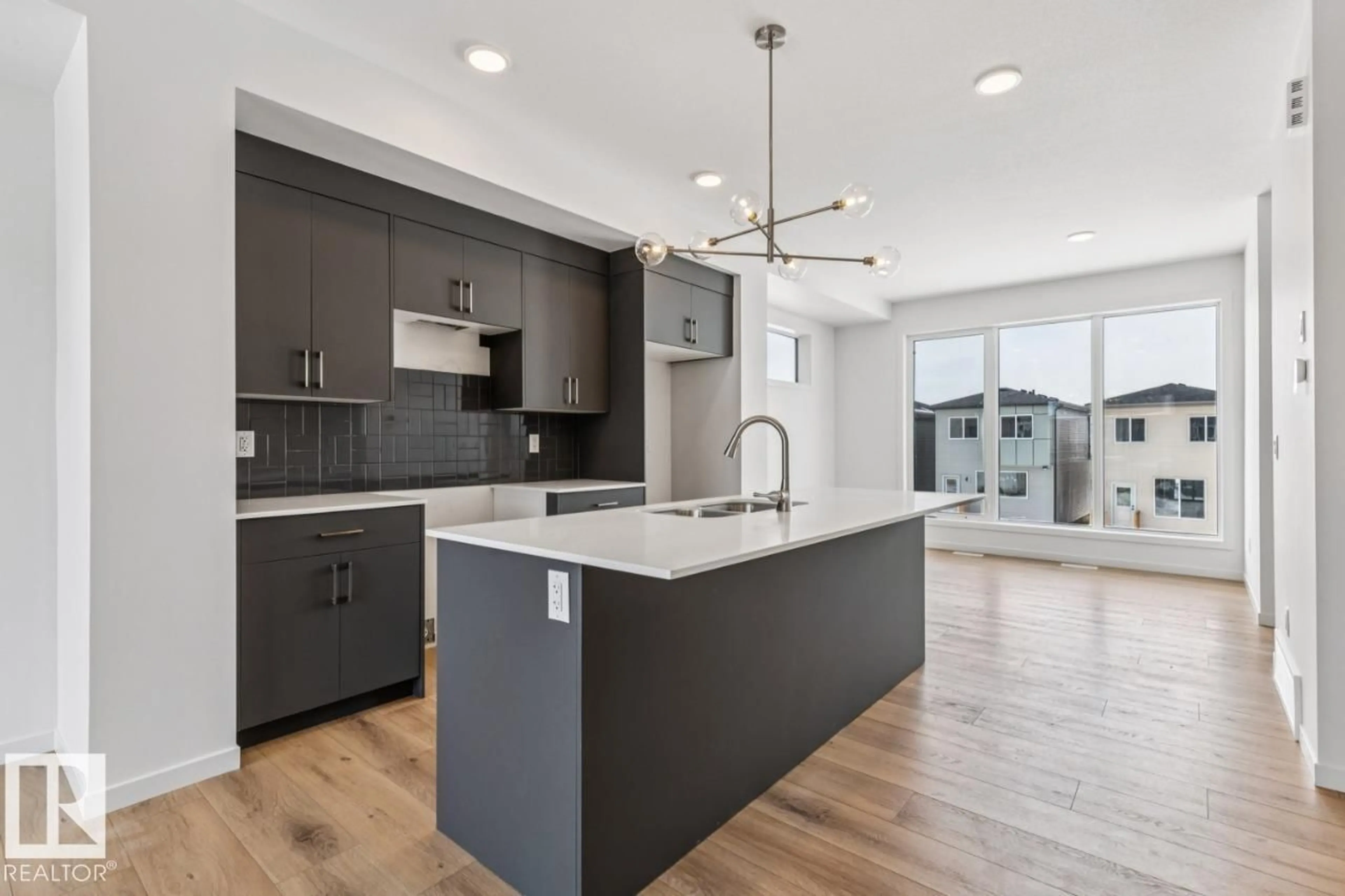 Open concept kitchen, unknown for 2618 ALCES WY, Edmonton Alberta T6X3L5