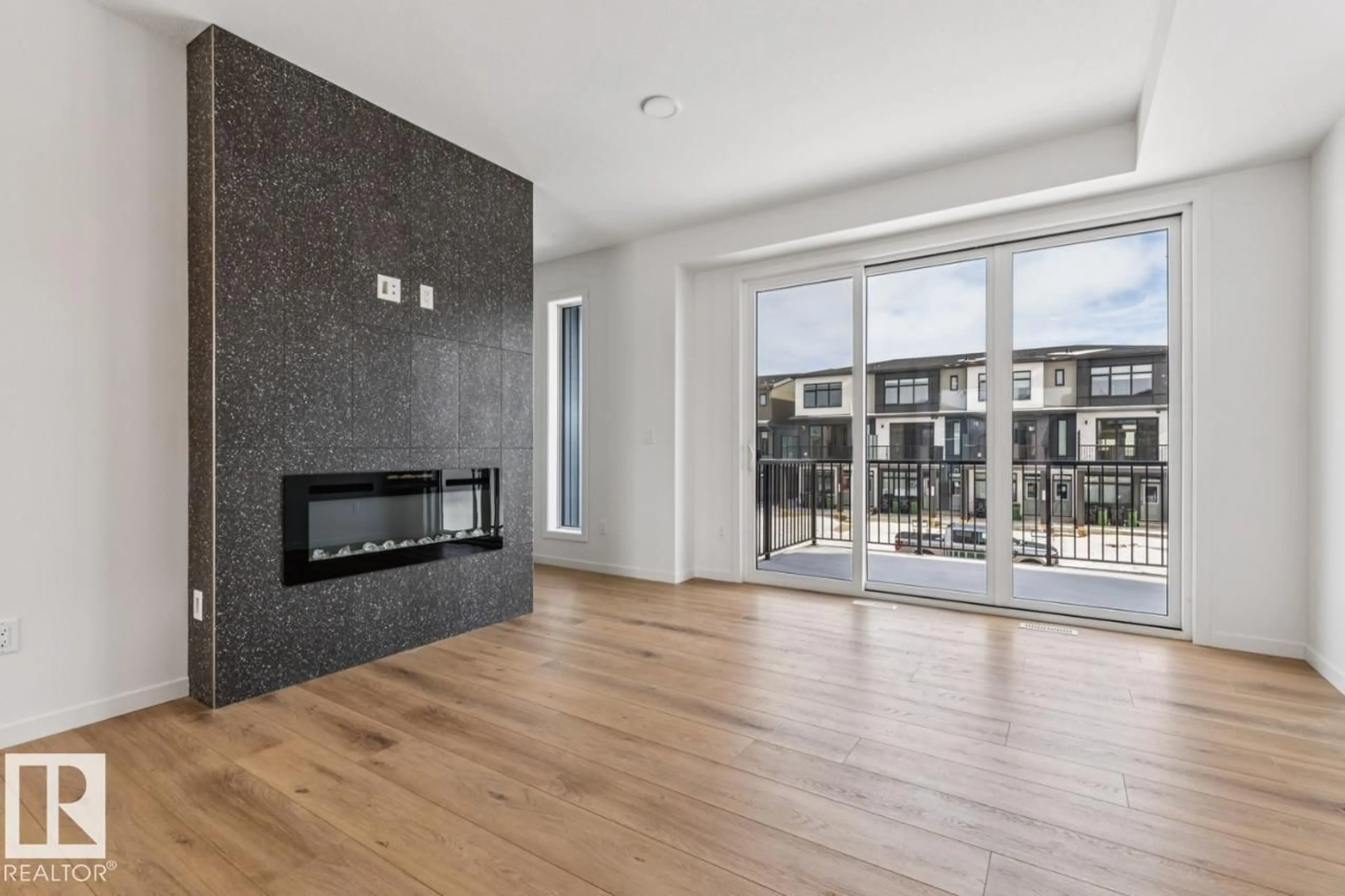 Living room with furniture, wood/laminate floor for 2618 ALCES WY, Edmonton Alberta T6X3L5