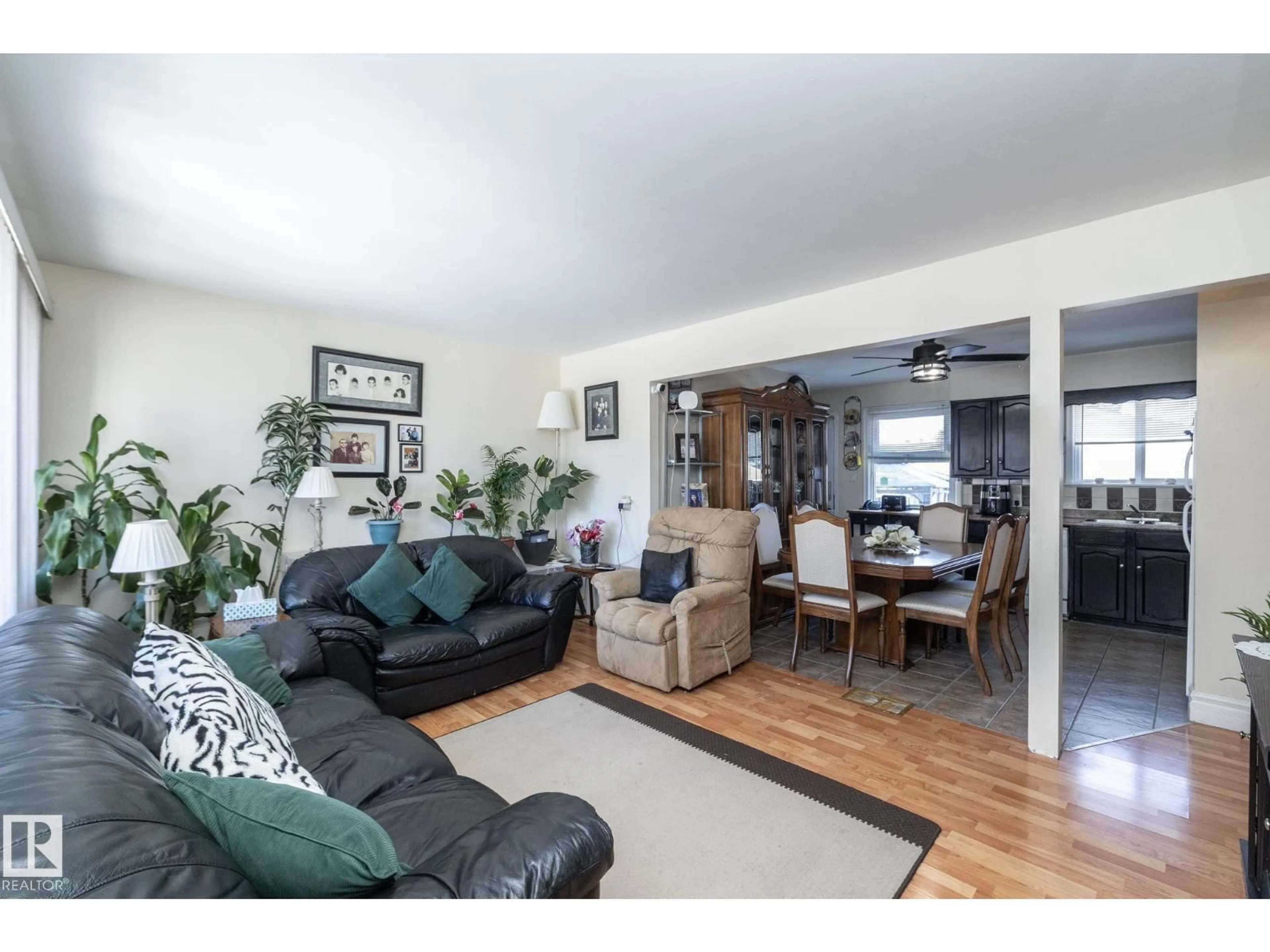 Living room with furniture, wood/laminate floor for NW - 9702 163 ST, Edmonton Alberta T5P3M8