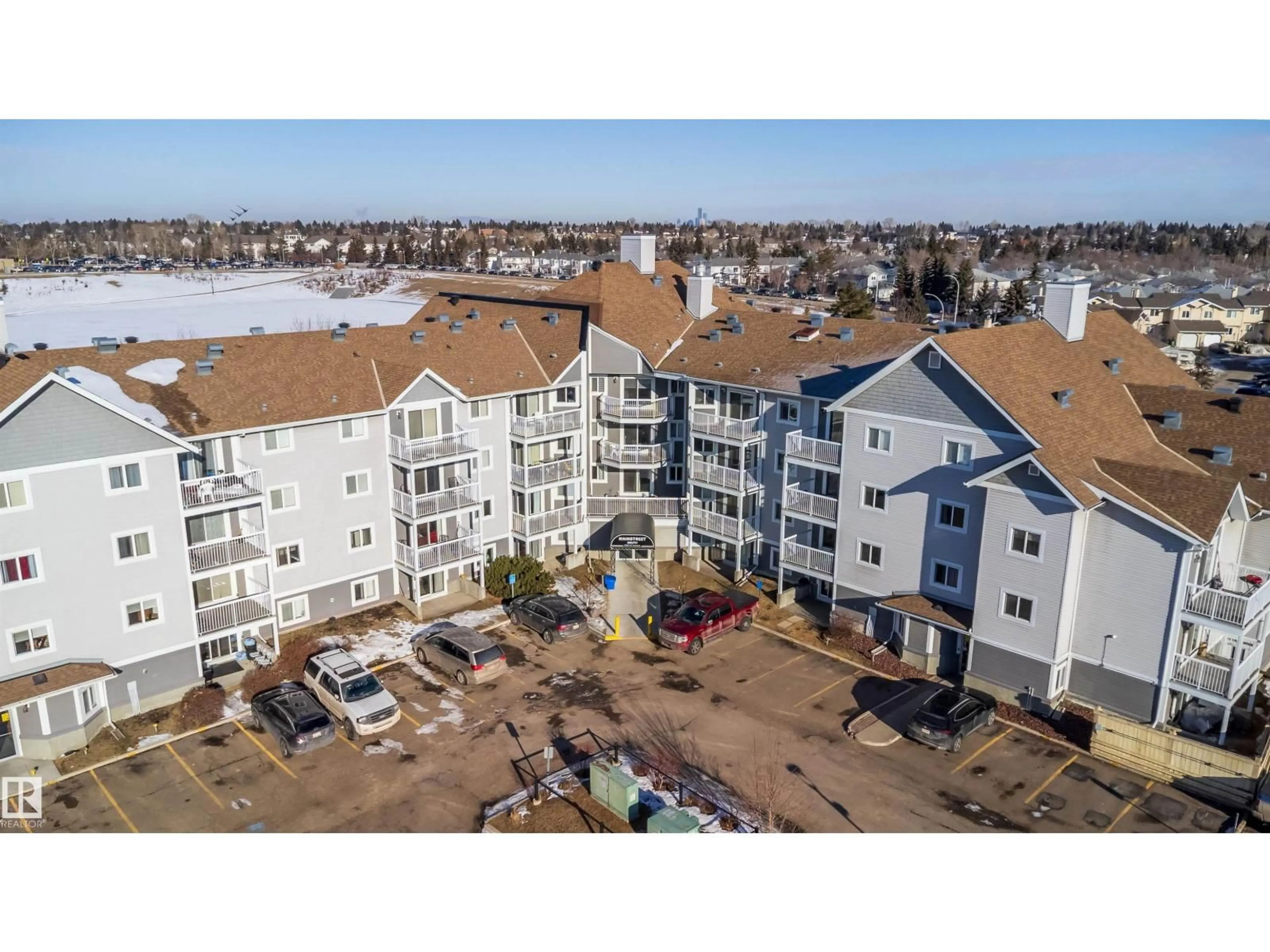 A pic from outside/outdoor area/front of a property/back of a property/a pic from drone, unknown for #213 - 5065 31 AV, Edmonton Alberta T6L6S5