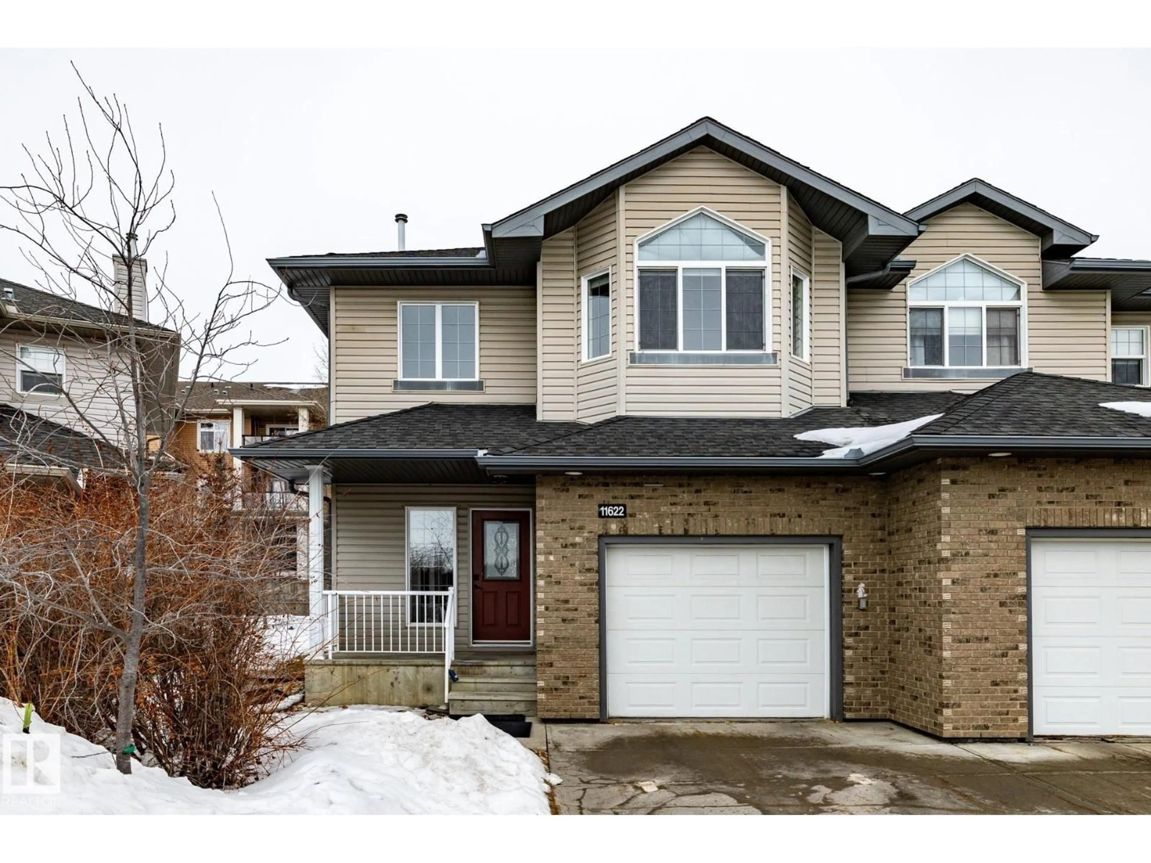 Home with brick exterior material, street for 11622 11 AV, Edmonton Alberta T6W1W8
