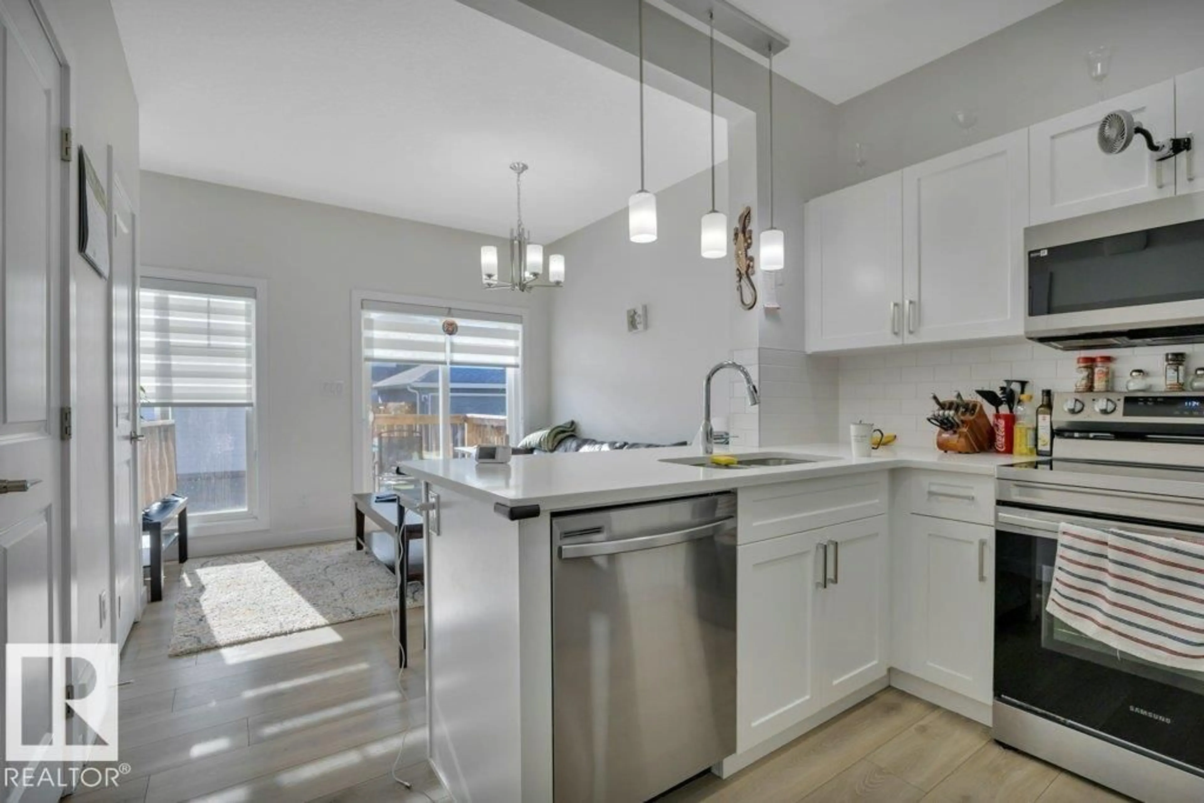 Open concept kitchen, ceramic/tile floor for 603 - 46 ORCHARDS BV, Edmonton Alberta T6X2W8