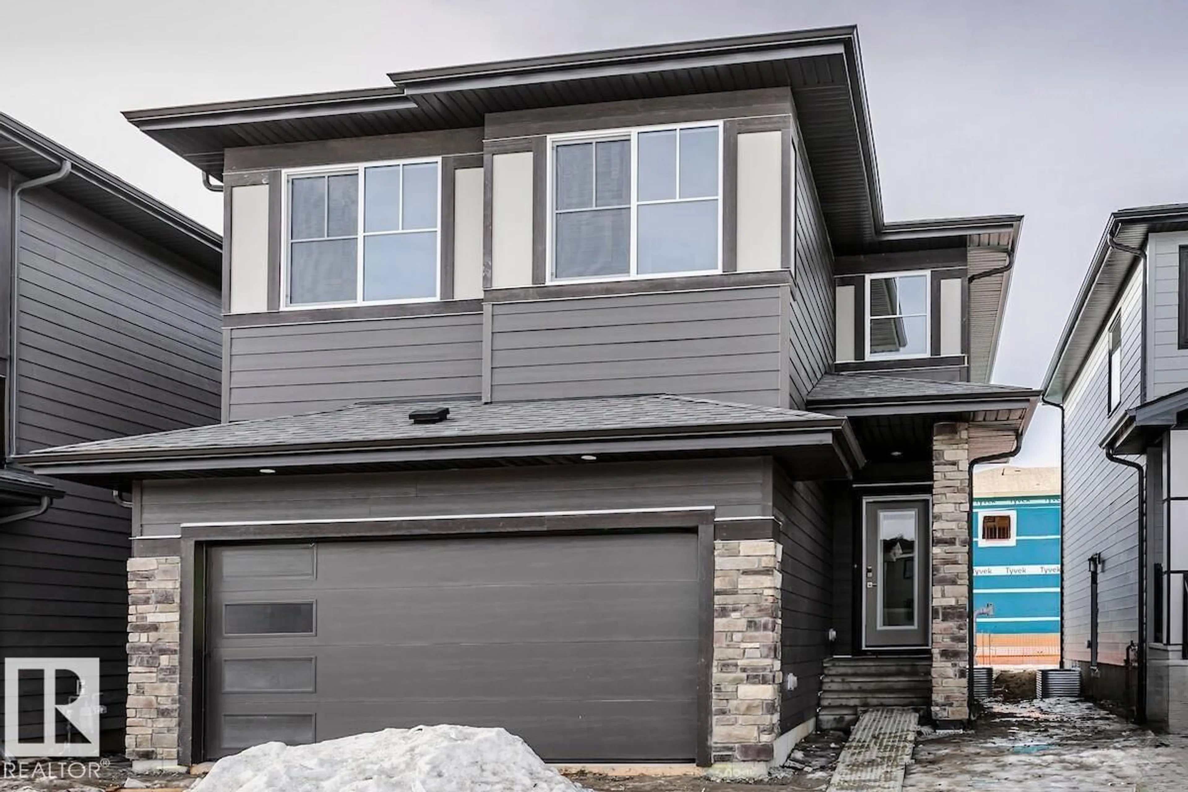 Home with vinyl exterior material, street for 7622 KIMIWAN CR, Edmonton Alberta T6W1A5