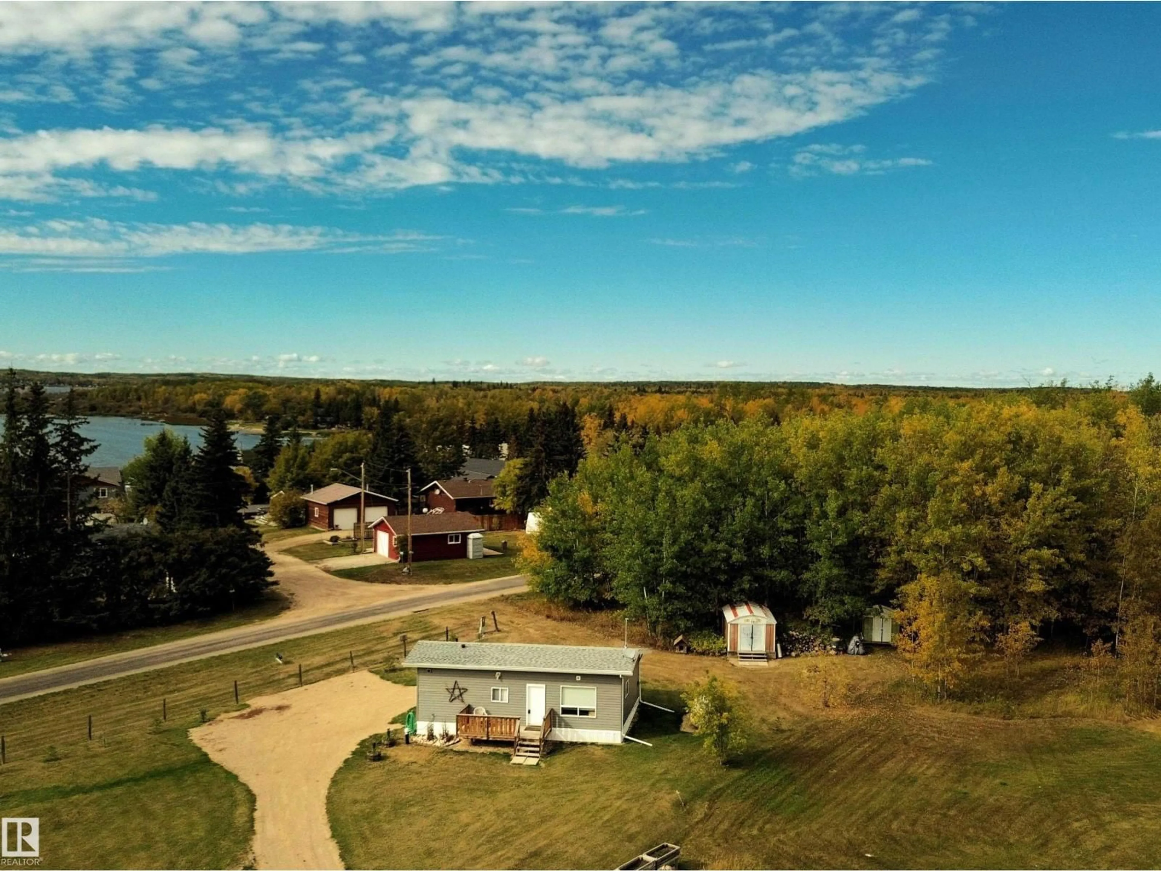 A pic from outside/outdoor area/front of a property/back of a property/a pic from drone, water/lake/river/ocean view for 106 - 57730 RANGE ROAD 30, Rural Barrhead County Alberta T0G0H0