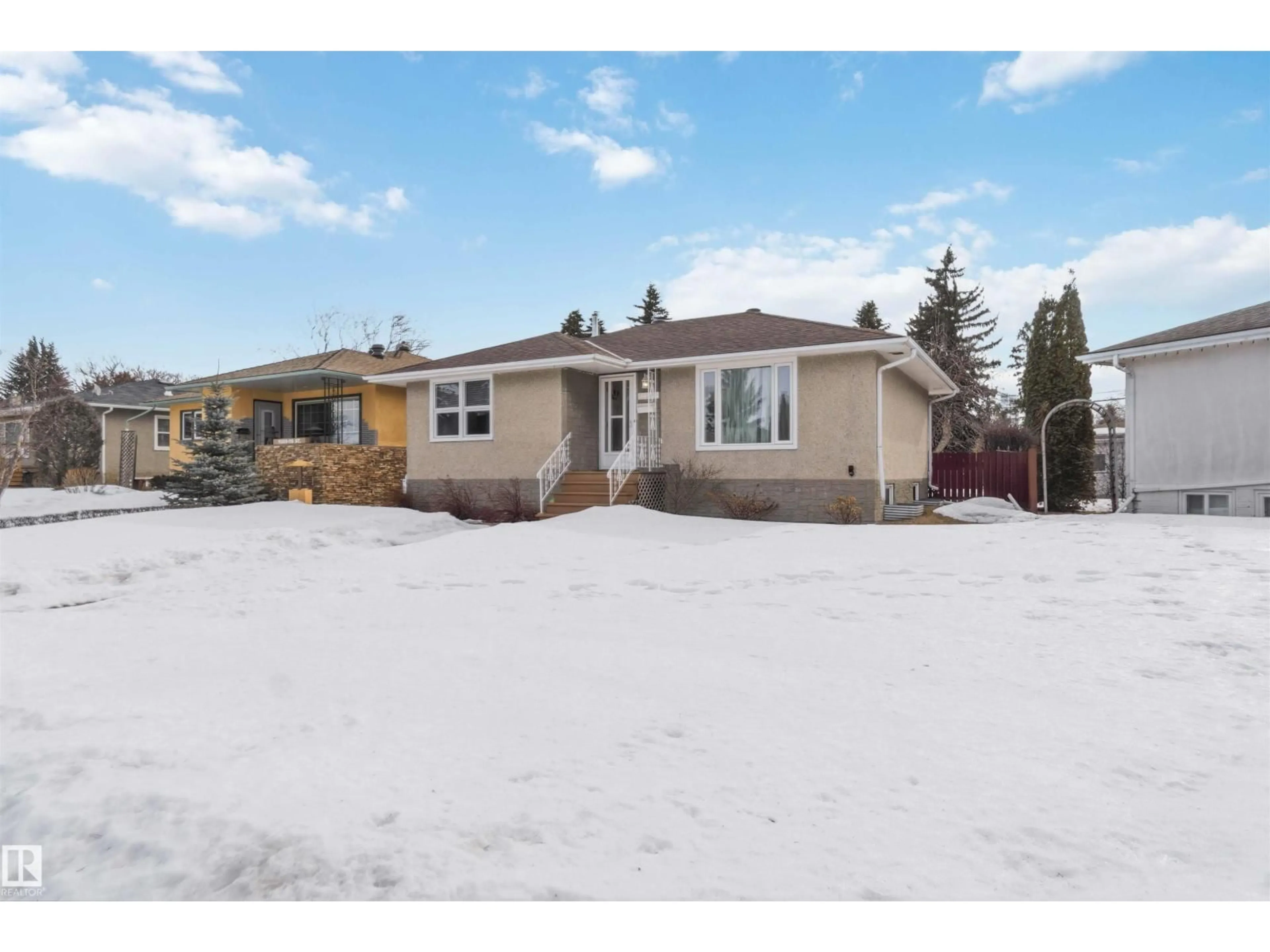 Home with vinyl exterior material, street for 11307 115 ST, Edmonton Alberta T5G2V5