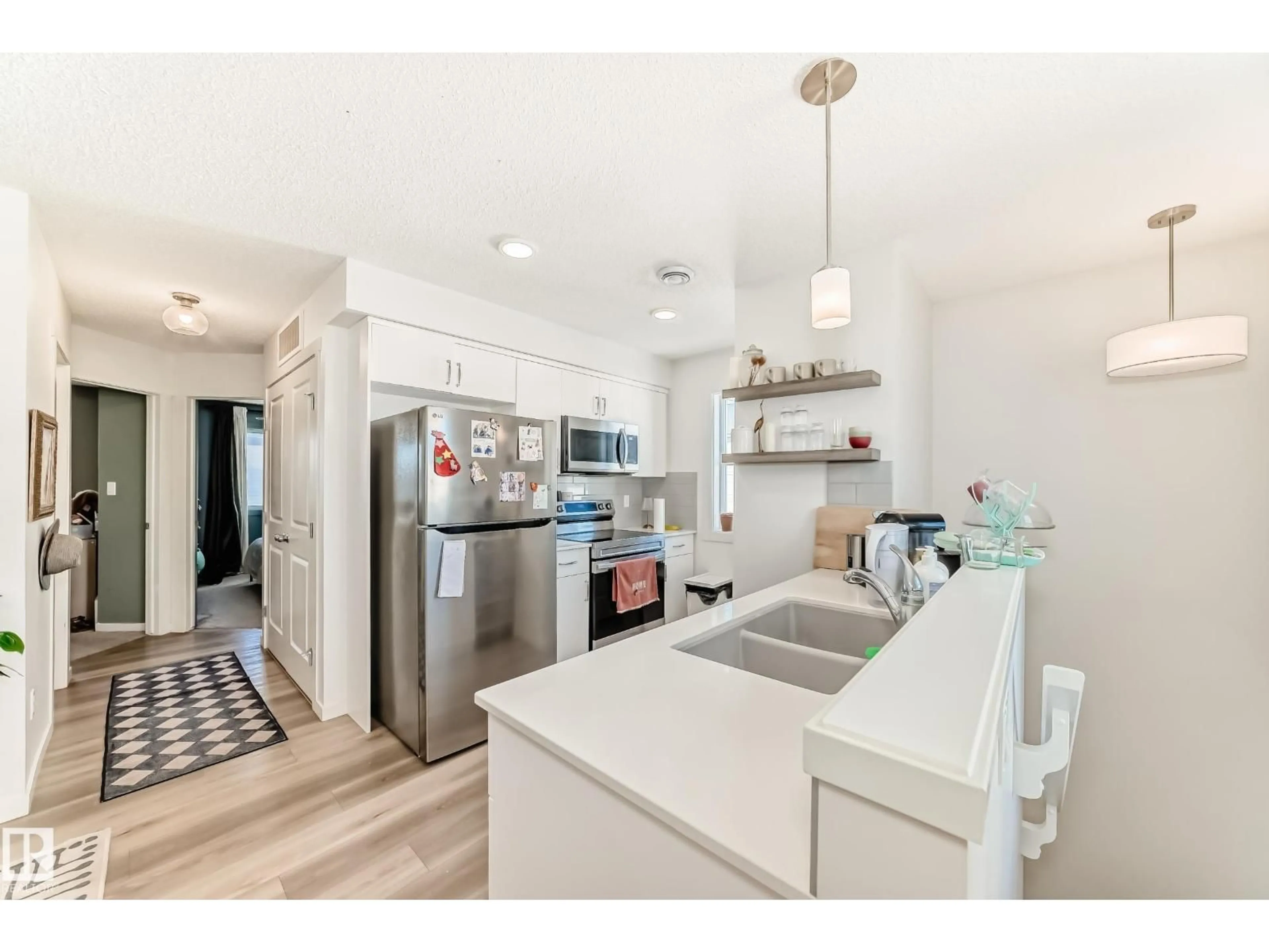 Open concept kitchen, unknown for #83 - 1203 163 ST, Edmonton Alberta T6W3X1