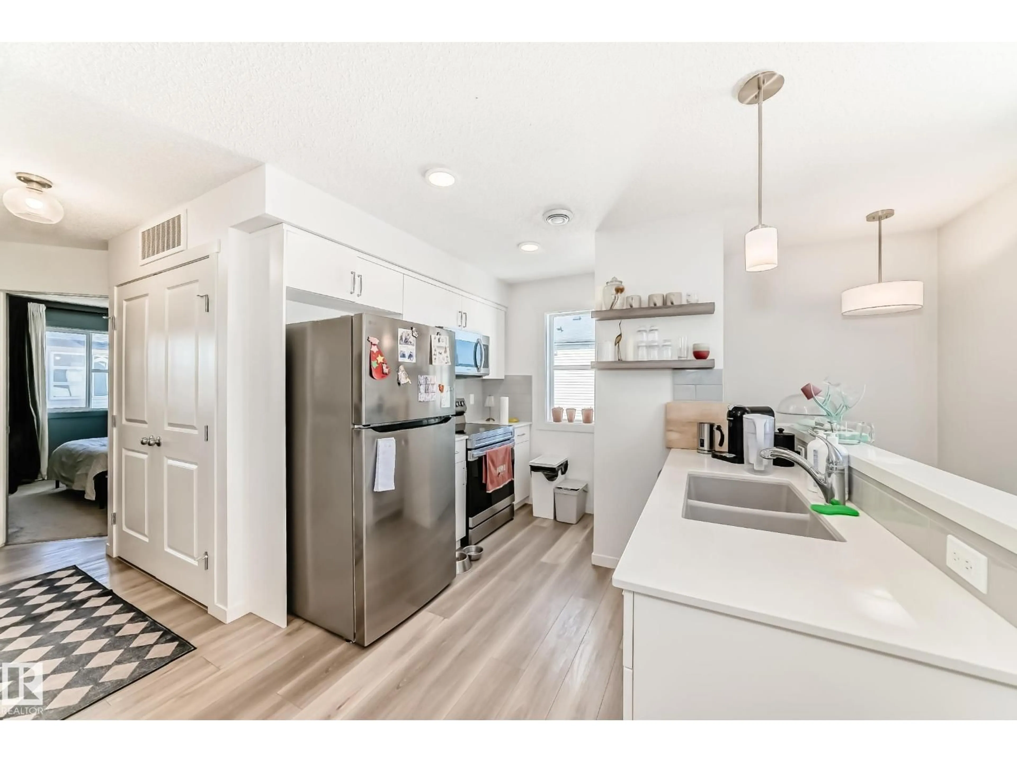 Open concept kitchen, unknown for #83 - 1203 163 ST, Edmonton Alberta T6W3X1