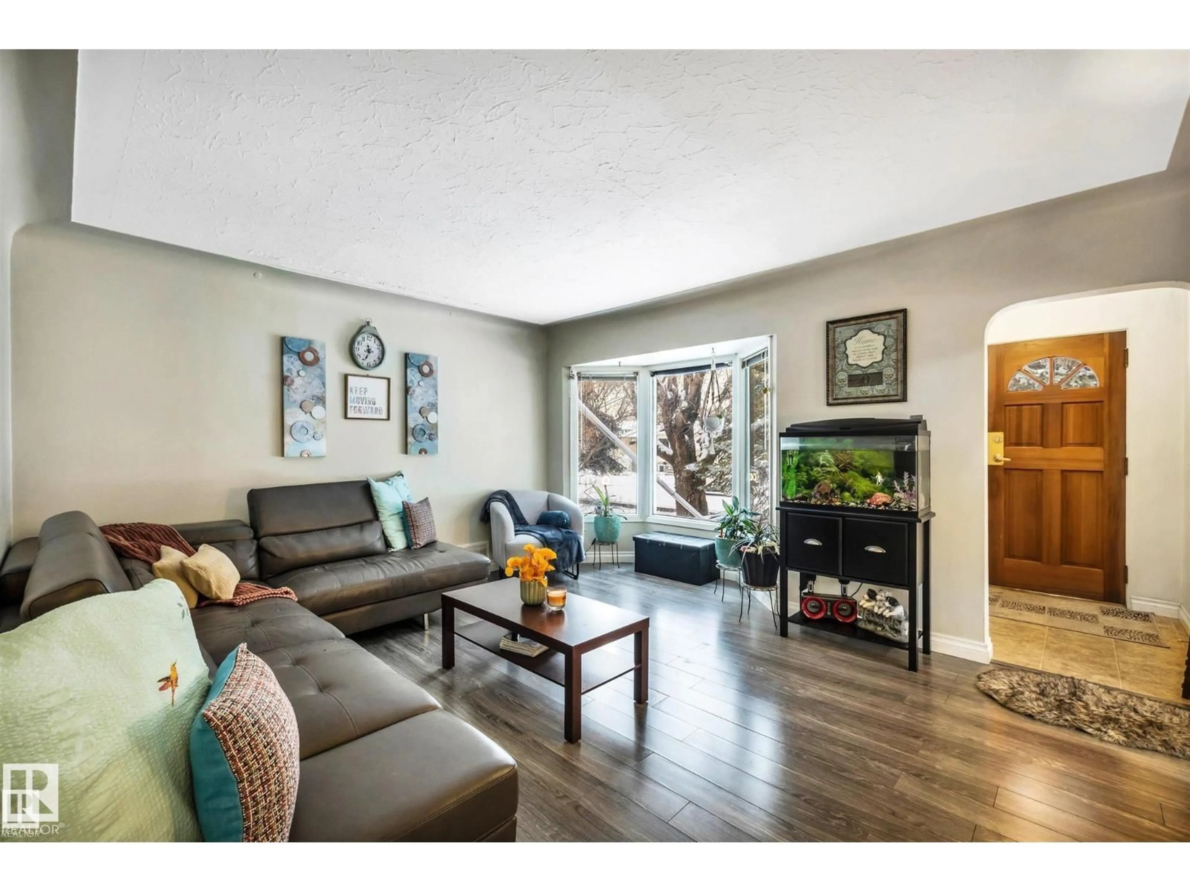 Living room with furniture, wood/laminate floor for NW - 12347 95 ST, Edmonton Alberta T5G1N4