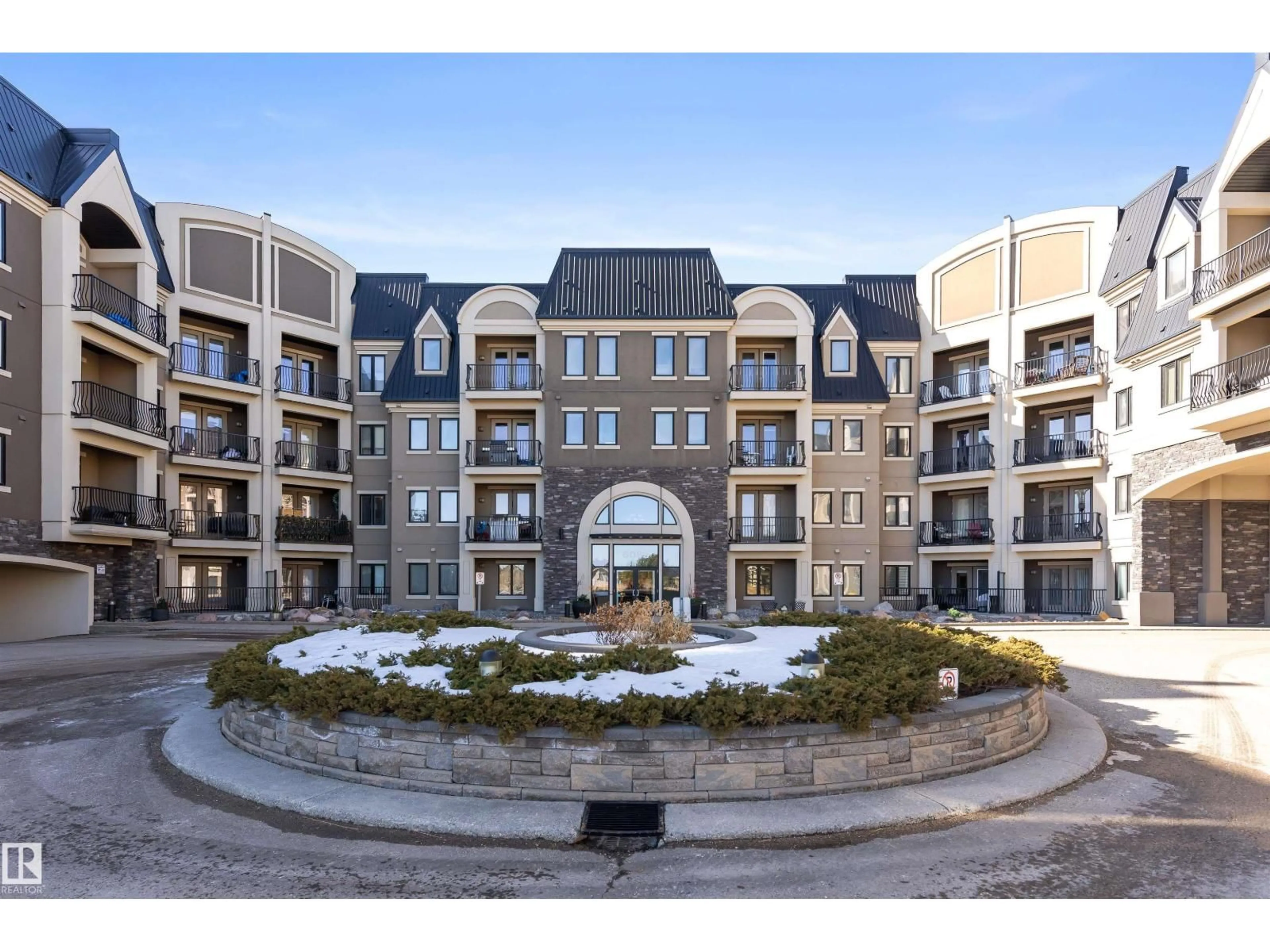 A pic from outside/outdoor area/front of a property/back of a property/a pic from drone, building for #427 - 6083 MAYNARD WY, Edmonton Alberta T6R0S5