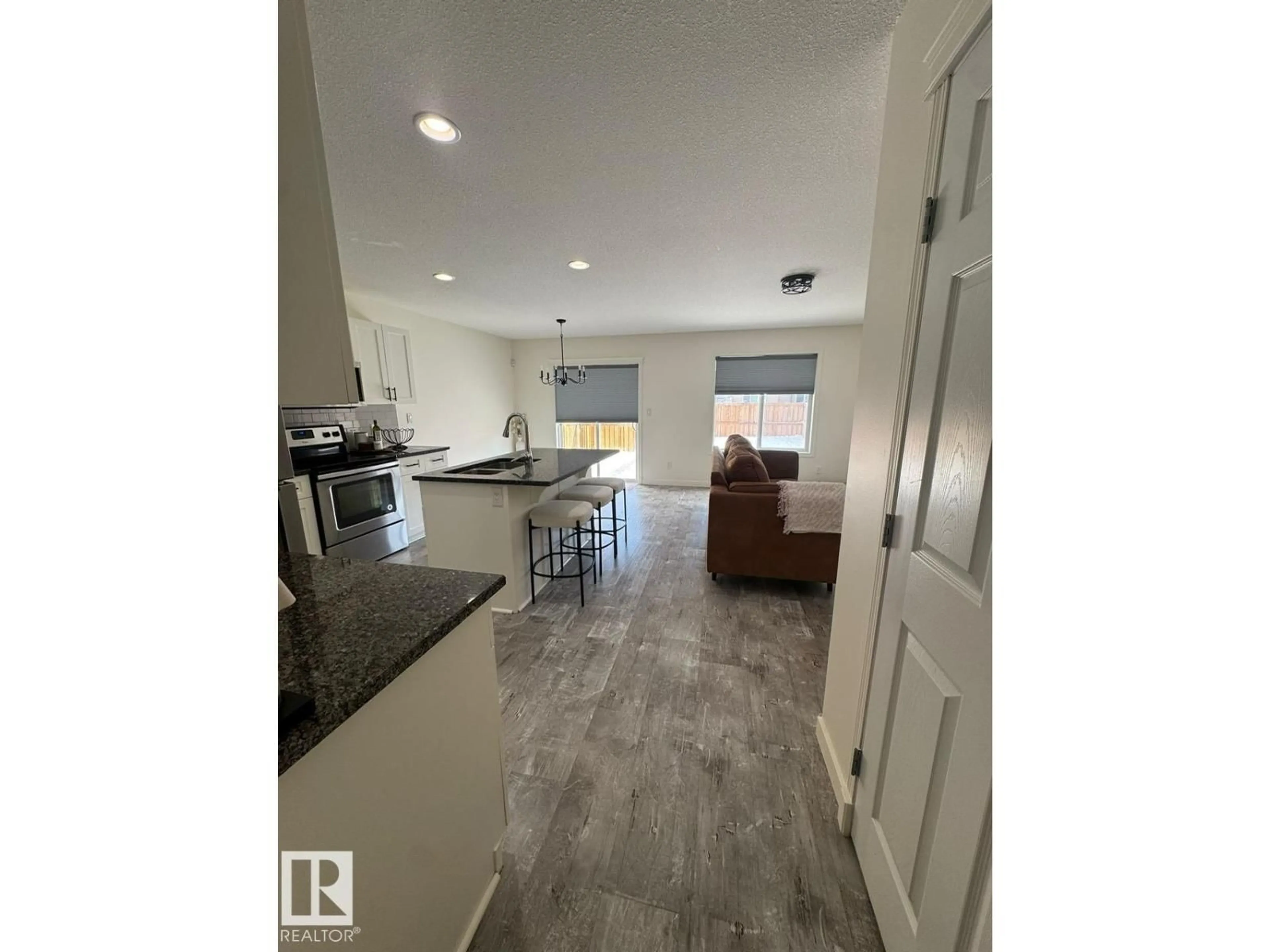 Open concept kitchen, unknown for NW - 17703 65 ST, Edmonton Alberta T5Y3X2