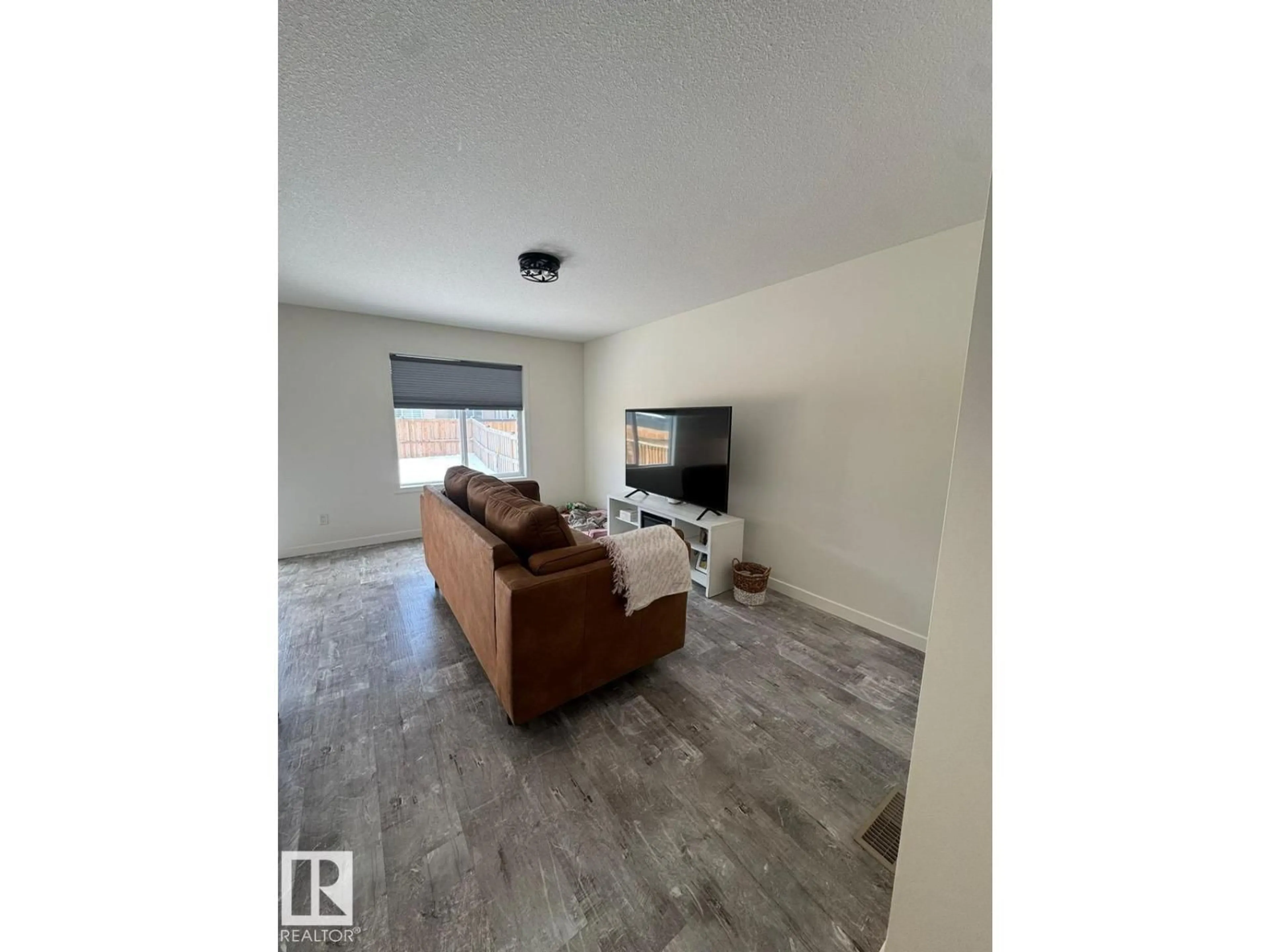 Living room with furniture, unknown for NW - 17703 65 ST, Edmonton Alberta T5Y3X2
